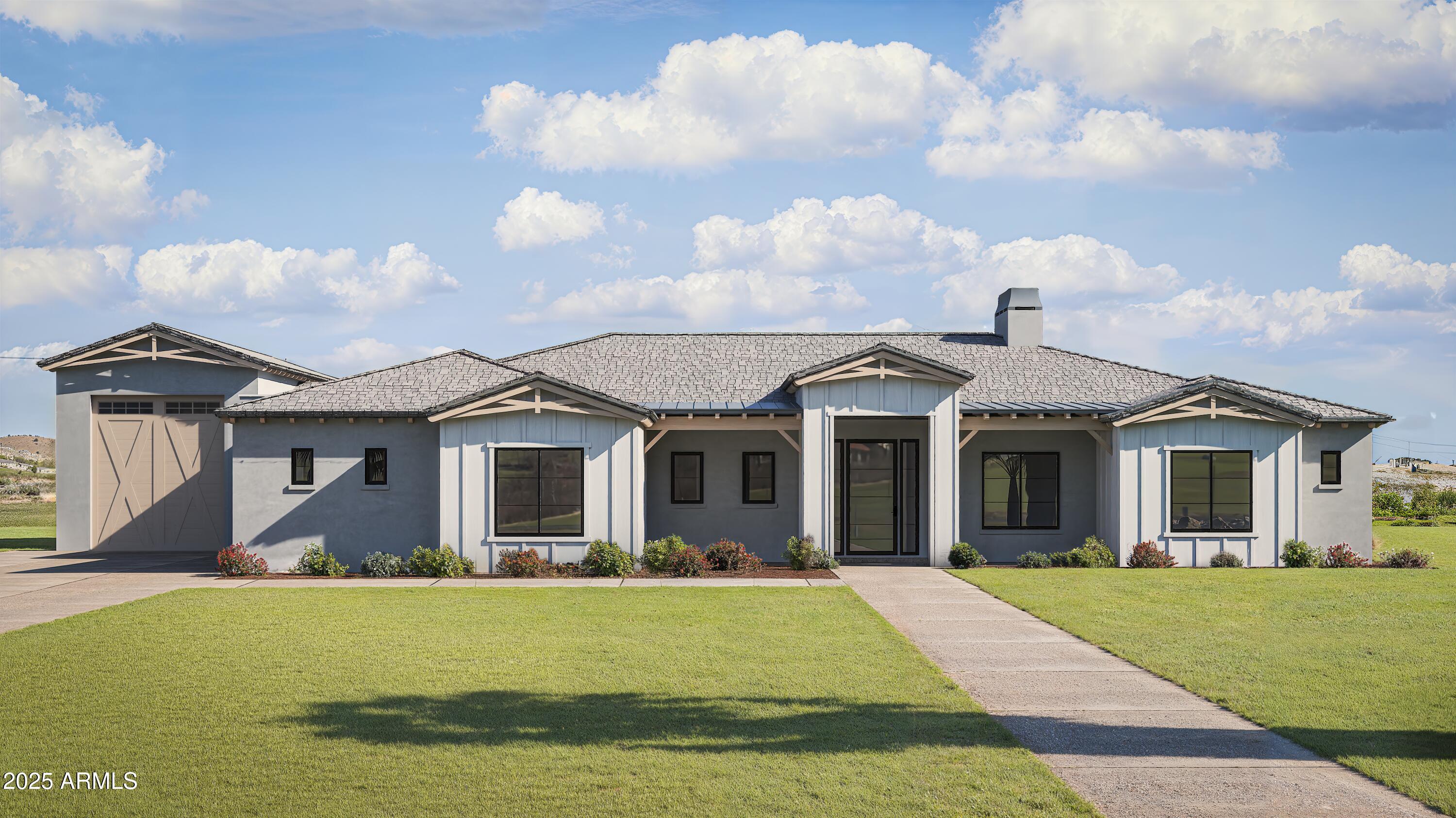 Construction is officially underway on this stunning new custom home featuring jaw-dropping finishes and an attached RV garage. Perched on an elevated 1-acre lot with full block fencing, no HOA, and breathtaking views of Cave Creek Peak and Pyramid Peak, this property truly stands apart. Inside, the gourmet kitchen impresses with upgraded appliances, upgraded cabinetry, quartz countertops, a massive center island, and a walk-in pantry complete with cabinetry and counter space. The spacious great room showcases a dramatic sliding glass wall that opens to the outdoors and a beautiful stone fireplace centerpiece. Luxury continues throughout the home with custom tile showers, wide-plank wood flooring, a freestanding soaking tub in the owner's suite, and countless designer touches.
