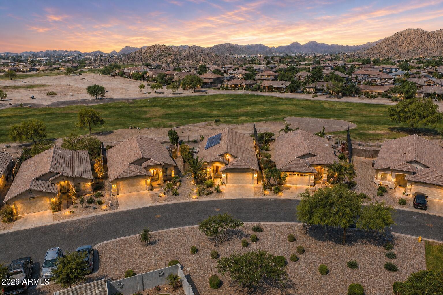 Golf Course Living with Space, Style & Endless Amenities! Located in sought-after Johnson Ranch with 300+ acres of green space, pools, spas, golf, lake, pickleball, tennis, basketball, volleyball, disc golf, & 19 playgrounds.  Owned solar panels, solar screens, all appliances stay. Well kept 1,924sf home on a premium golf course lot with serene mountain views. Move-in ready with brand-new carpeting, featuring a bright, open floor plan, tile flooring & a large sliding glass door that opens to a backyard overlooking the course & San Tan Mountain views. The kitchen has abundant cabinetry, generous counter space, center island, & pantry. The spacious primary suite includes a separate sitting area ideal for a home office or retreat, plus a full bath & walk-in closet. This one checks every box!