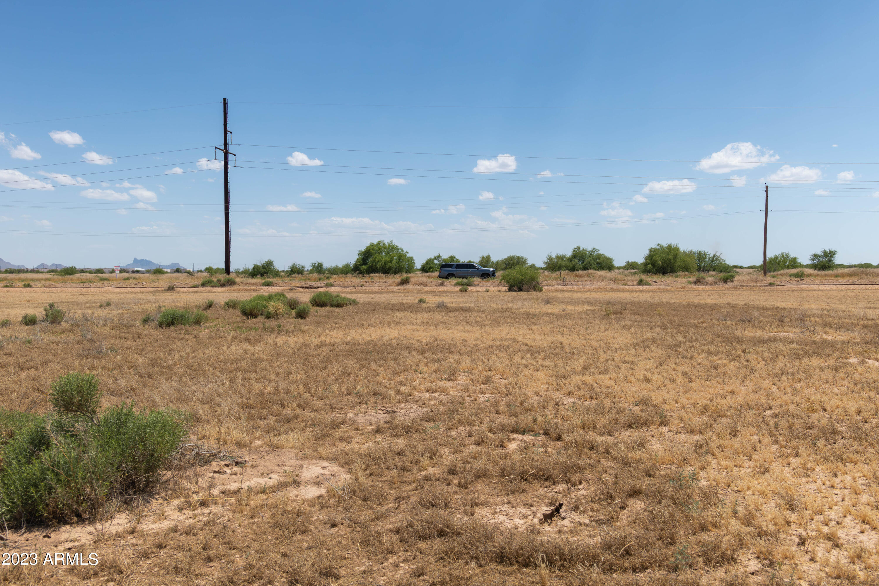 Flat Buildable property just feet north of Paved Hanna Road, with electricity on Hanna Road.  Close proximity to Interstate 10 and Interstate 8.
With massive growth expected from Lucid Motors, Nokia, and everything else going on in Casa Grande, this would be just far enough away to escape and enjoy the peace and quiet!  Seller may carry with right offer!  Site built or manufactured ok!