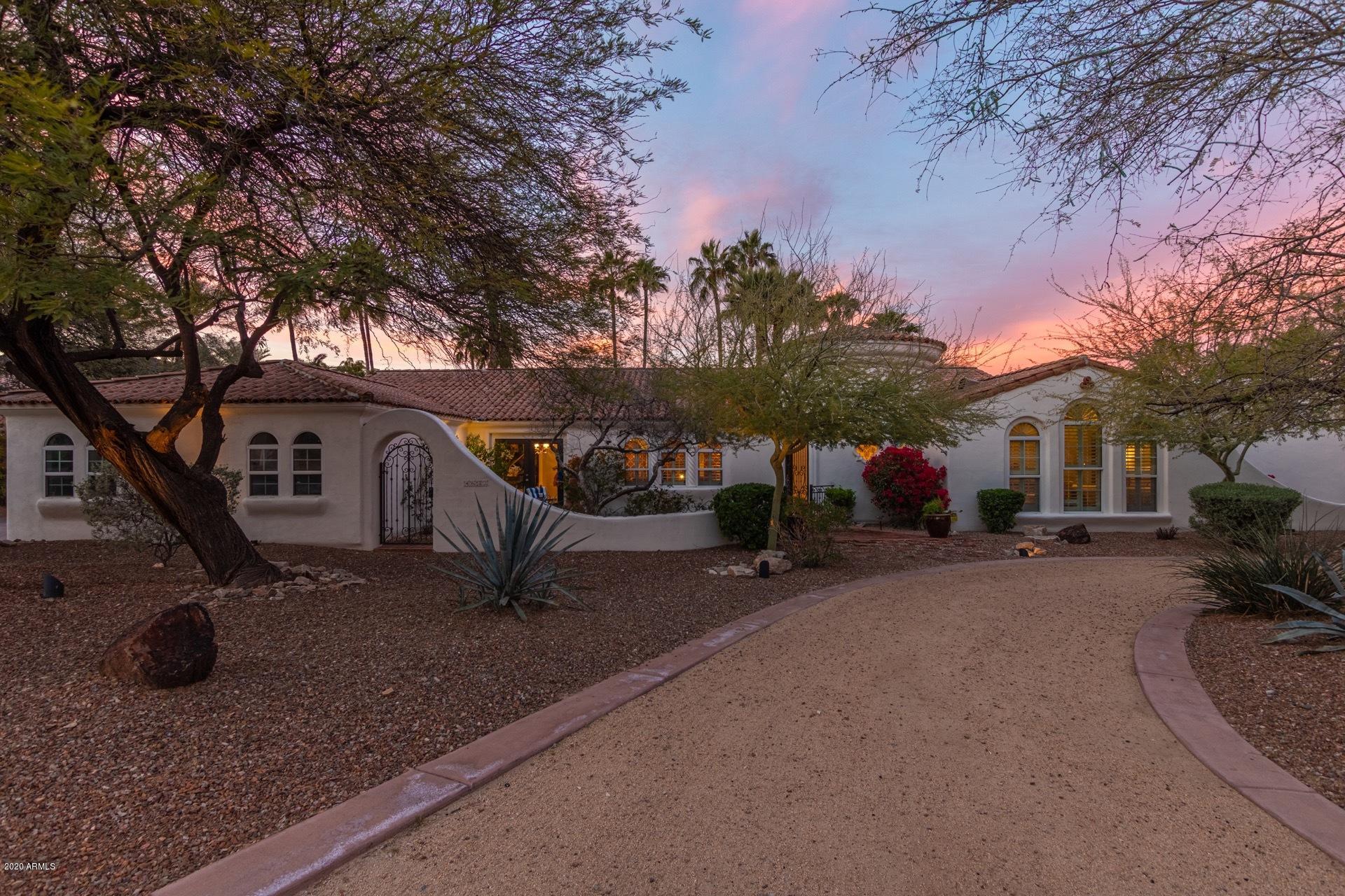 This home is gorgeous inside and out!  rebuilt in 1998 in  TATUM MOUNTAIN ESTATES Beautiful curb appeal with inviting courtyard, side entry 3 car garage and RV gate. Enter the home to a beautiful formal dining room with plantation shutters, travertine floors, roman pillars . The family room has a cozy fireplace and gorgeous wide plank wood floors. The eat-in kitchen has a breakfast bar, abundance of custom white cabinets, granite counters, gas cook top, wall mount oven & microwave. Each bedrooms has a private entrance and en-suite. The master has built-in closets & dressers, sitting area and french doors to the en-suite. The en-suite includes a split double vanity, tiled walk-in shower, step up roman tub with pillars and a custom walk-in closet. Home office. Guest room has secret door to a sitting area! Can you guess where it is? Cassita has a living room/bedroom and a 3/4 bath. The amazing backyard is perfect for entertaining with covered patios, courtyards, diving pool, conversation areas, lower yard has synthetic grass for a mini golf course. New roof in 2018. There is so much more to this property than can mention! No HOA! Call for a private showing today!