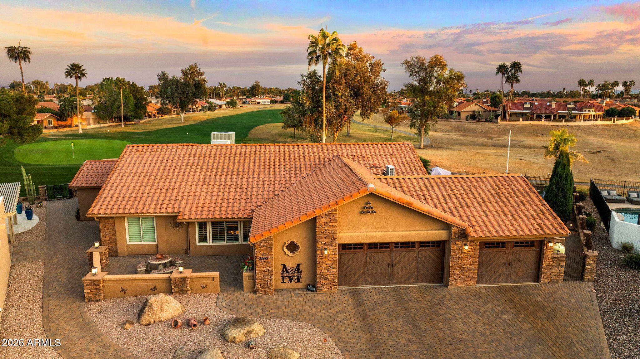 This stunning, remodeled home sits on a premium golf course lot on the 4th green of Coyote Run. From the moment you arrive, you'll love the inviting front courtyard and pavered entry! Enter into an open and spacious home with vaulted ceilings and recessed lighting. The Interior offers the perfect harmony of modern elegance showcasing the tile flooring, stylish light fixtures and plenty of natural light.  The gourmet kitchen is equipped w/stainless appliances, tile backsplash, granite counters & drop pendant lighting. The sizeable Primary bedroom provides a relaxing retreat w/wonderful views of the golf course! The breathtaking backyard is great for relaxing or entertaining w/a private entrance to the golf course. The Full Length 3-car Garage & Double golf cart garage are spectactular!