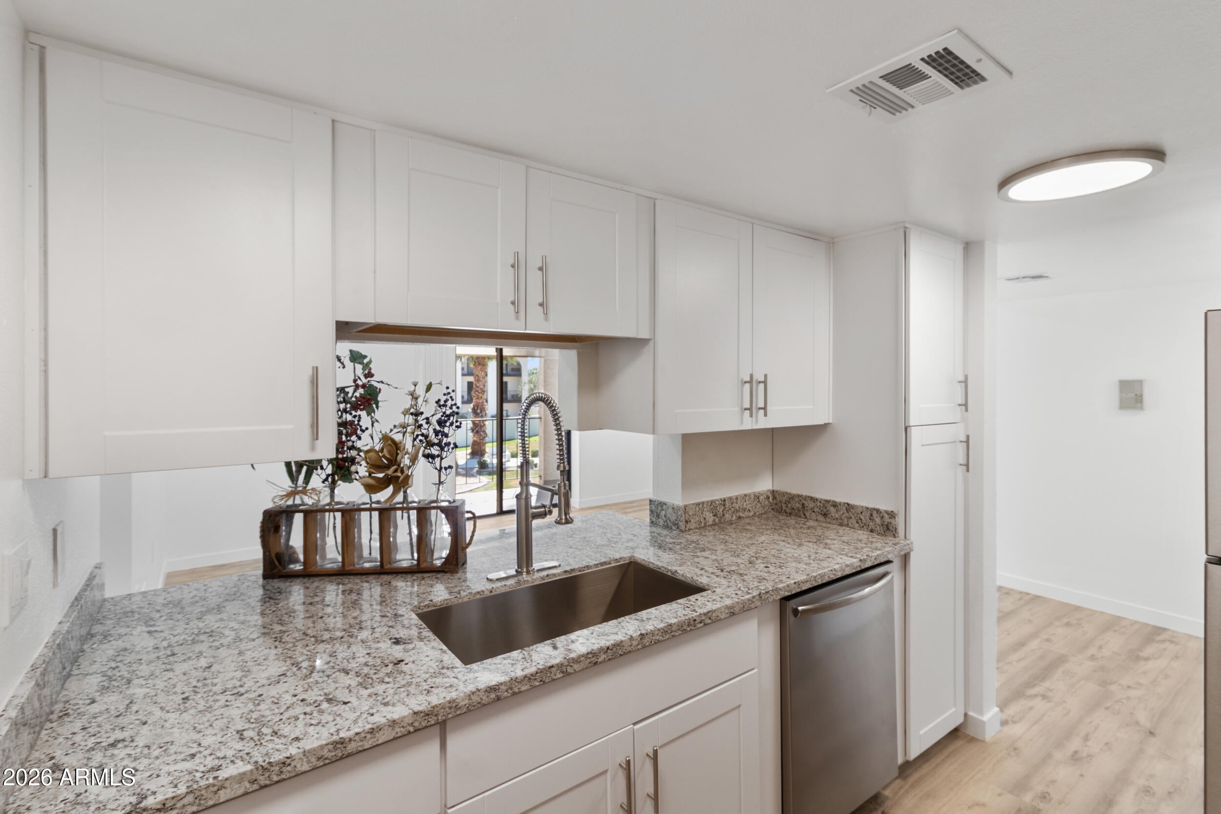 VA,FHA,CONVENTIONAL APPROVED,RENTALS OK/NO RESTRICTIONS,PET FRIENDLY,ONLY 12 2 BEDROOM 1 BATHROOM CONDOS TOTAL.CORNER UNIT TUCKED AWAY FOR UNIQUE PRIVACY,LARGER PATIO W/VIEW OF THE LUSH LANDSCAPING AND LIGHTED WALKWAYS.ROLL DOWN SUNSHADES FOR PRIVACY,GRANITE COUNTEROPS,STAINLESS APPLIANCES,LARGE PANTRY/STORAGE,6 PANEL DOORS,BRUSHED NICKEL FIXTURES,GLASS TILE WALK IN SHOWER W/GRAB BARS,EXTRA CABINETRY FOR STORAGE,SEPERATE LINEN CLOSET,REMOTE CEILING FANS,WIDE PLANK LVP FLOORING THROUGHOUT.SIMPLISTIC LIFESTYLE IN A SENIOR LIVING 55+ PLUS COMMUNITY*LOVELY CONDO NESTLED BETWEEN ARCADIA AND THE BILTMORE WITHIN WALKING DISTANCE OF SHOPPING, RESTAURANTS AND SENIOR CENTER,WELL MAINTAINED GROUNDS,EXERCISE FACILITY,LIBRARY &CONFERENCE ROOMS,COMMUNITY BACKS RIGHT UP TO LOS OLIVOS PARK/FRISBEE GOLF