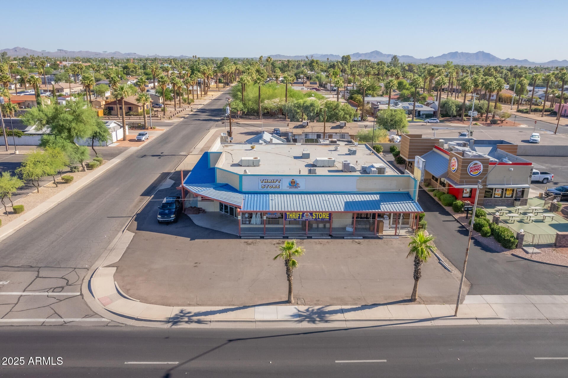 Exceptional retail investment opportunity on Casa Grande's busiest corridor! Located at 800 E. Florence Blvd, this highly visible property offers prime frontage and easy access along the city's main retail artery. Formerly a thriving thrift store, the open floor plan and flexible zoning make it ideal for owner-users or investors seeking strong visibility and long-term growth potential. Perfect for discount retailers, boutique shops, fitness centers, appliance/furniture stores, specialty markets, medical offices, or franchise concepts looking to capture Casa Grande's rapid commercial and residential expansion. Excellent signage, ample parking, and unbeatable traffic exposure—position your business for success here.