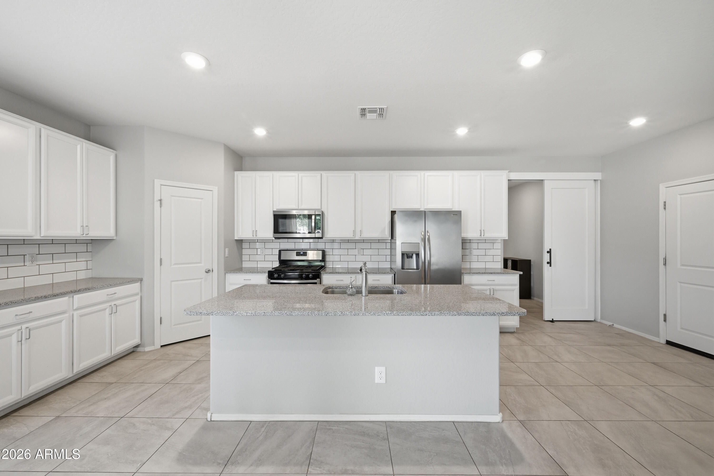 A rare opportunity to own an energy efficient home in an unbeatable location. Pride of ownership shines throughout and enjoy the paid off solar and a home that has only had one meticulous owner!

Designed with both entertaining and everyday living in mind, the open-concept layout seamlessly connects the indoor and outdoor spaces. The star of the home is the chef's kitchen, showcasing upgraded 42-in. upper cabinets, granite countertops, a spacious island, stainless steel appliances including a gas range, and a walk-in pantry. The split floorplan offers ideal privacy and functionality for families or guests. The dining area opens to an extended covered patio and private backyard with low-maintenance desert landscaping- perfect for gatherings and relaxing evenings outdoors. Built for superior efficiency and comfort, this home also features a tankless gas water heater, Carrier 16 SEER air conditioner with programmable thermostat, and low-E windows. Conveniently located with easy access to downtown Gilbert, top-rated restaurants, shopping, dining, parks, the public library, and more -- this home truly combines location, lifestyle, and long-term savings.