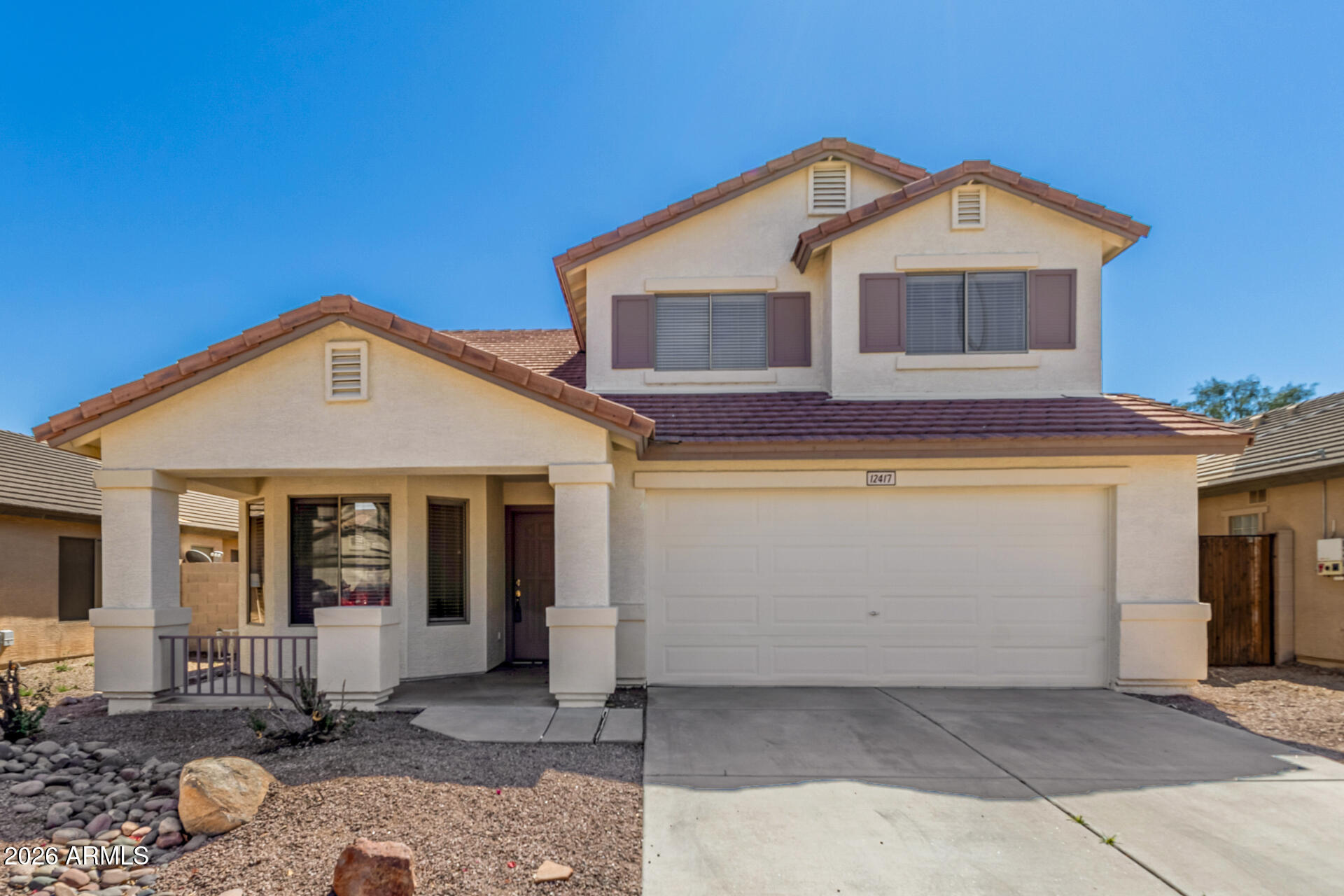 Move-in ready home in a desirable community! Ideally located just minutes from State Farm Stadium, Westgate Entertainment District, & Camelback Ranch, offering convenient access to dining, shopping, & entertainment. Home features new interior & exterior paint along with brand-new carpet throughout. The spacious primary suite offers a large walk-in closet, dual sinks, and a separate shower and soaking tub. The eat-in kitchen includes a breakfast bar and opens to the family room, creating an ideal layout for everyday living and entertaining. All appliances are included, making this home truly turnkey. Additional highlights include a 2-car garage and a low-maintenance backyard that's currently a blank slate--ready for your personal design ideas! Hurry to this fantastic opportunity!