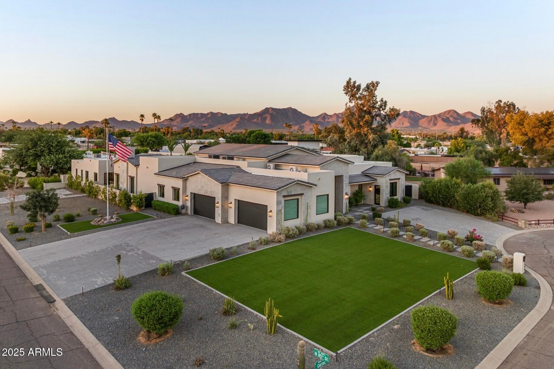 Luxury redefined in the heart of Scottsdale. This spectacular updated estate offers 6 bedrooms, 7 bathrooms, and a brand-new 774 sq/ft casita on a sprawling 34,991 sq/ft cul-de-sac lot with panoramic mountain views - complete with full AV smart home accessibility (see full list of features in ''Docs'' tab). Designed for elevated living, this home boasts a dramatic entry, a light-filled great room centered around a striking statement fireplace, and soaring 14' ceilings. The stunning gourmet kitchen is a chef's dream featuring dual islands, granite countertops, and custom designer cabinetry, including a custom hidden walk-in pantry. A climate-controlled wine wall also adds a touch of elegance for the discerning entertainer. Walls of glass and retractable doors create a seamless transition to the stunning resort-style backyard complete with a sparkling lap pool, spa, outdoor kitchen, fire pit, sport court, and expansive entertaining spaces. A newly added home gym equipped with a spa room provides a private wellness escape, while the sleek family room with floor-to-ceiling sliders and a modern fireplace perfectly captures Arizona indoor / outdoor living. Additionally, 4-car garage completes this exceptional property. From luxury amenities to timeless design, this one-of-a-kind desert retreat is truly an entertainer's paradise.
