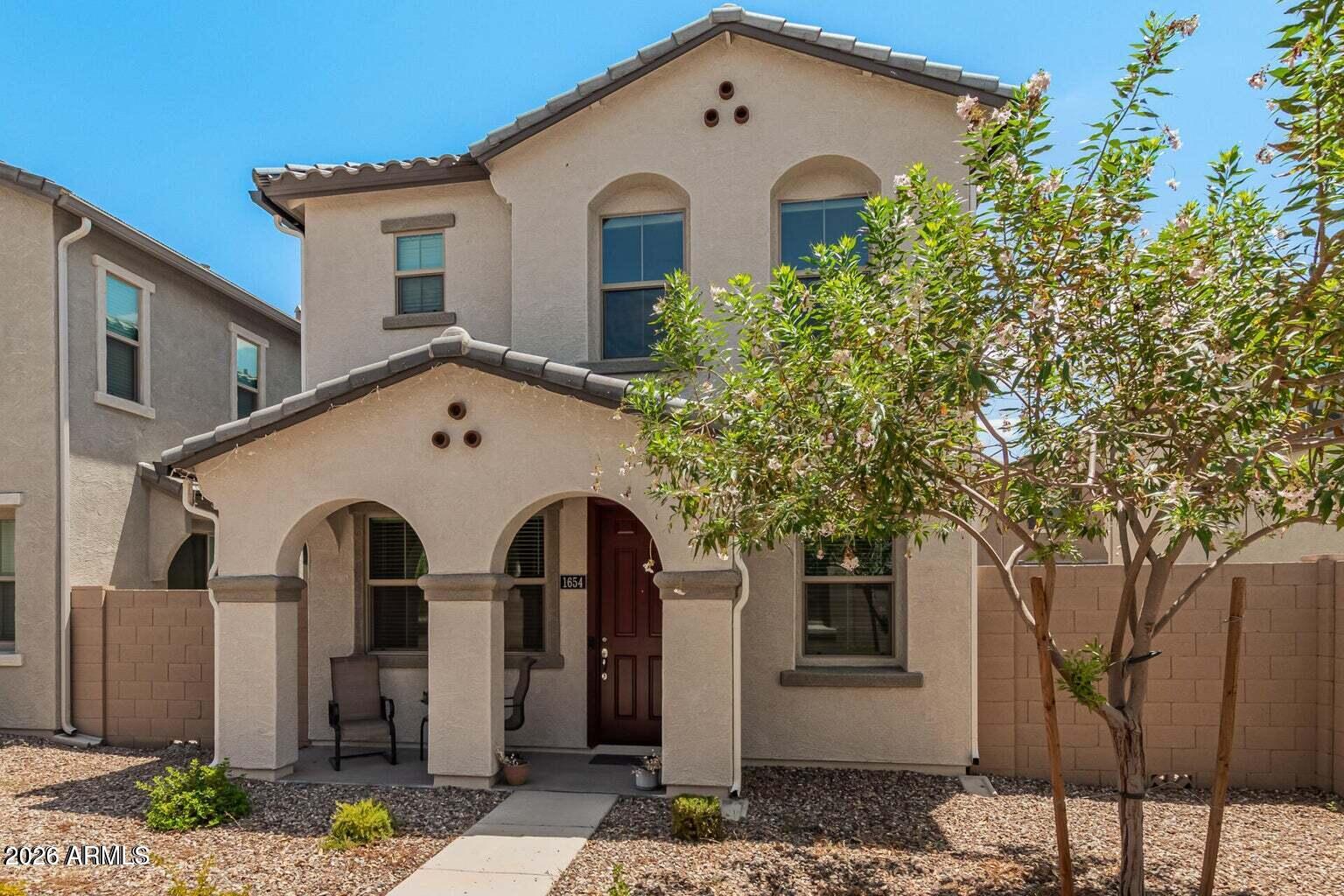 Beautifully maintained 3 bed, 2.5 bath 2020-built home conveniently located near major freeways for easy commuting. Step inside to a bright, open layout filled with natural light and upgraded cabinetry, perfect for everyday living and entertaining. Upstairs features a split floor plan with a convenient laundry room and spacious bedrooms. The primary suite includes dual sinks, a large walk-in closet, and a private ensuite. Enjoy a low-maintenance backyard with pavers and artificial turf, ideal for relaxing or hosting. Additional highlights include epoxy garage floors, water softener, and included washer, dryer, and refrigerator. HOA maintains front landscaping and offers access to a pool, parks, and playgrounds. Move-in ready and designed for easy living!