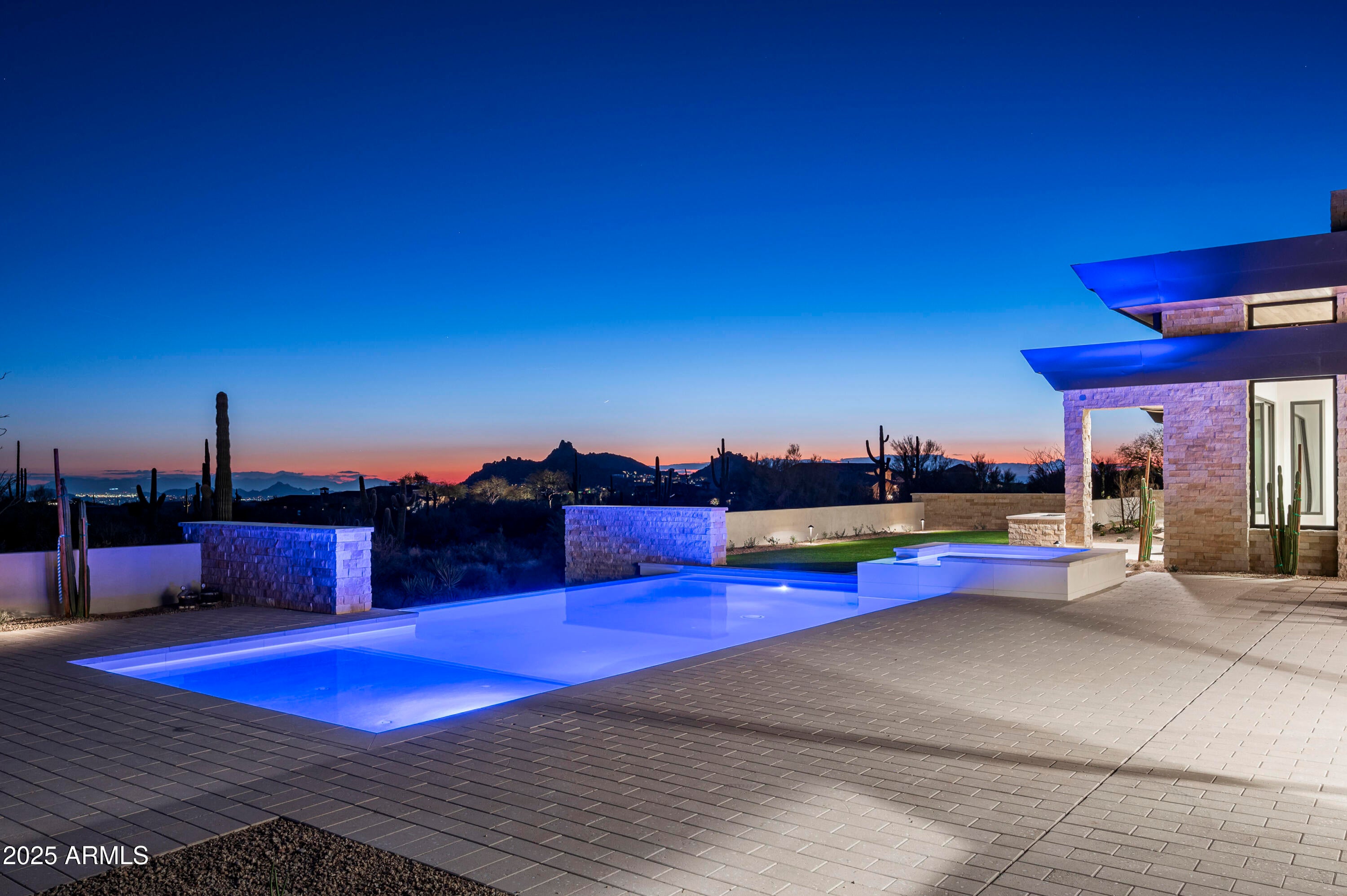 Completed January 2025.  Introducing this breathtaking, newly constructed estate located in the desirable Goldie Brown Ranch in North Scottsdale, just moments from the Four Seasons Resort and renowned Scottsdale National Golf Club. Designed by the acclaimed Swaback Architects and built by Sonora West Development, this sophisticated and contemporary single-level home embodies the pinnacle of modern luxury.
Offering an expansive 5-bedroom, 6.5-bathroom layout, plus an office and private guest casita, this home offers the perfect blend of elegance and functionality. The open-concept great room serves as the heart of the home, seamlessly connecting to the gourmet kitchen and dining spaces. With meticulous attention to detail, every room is designed to take full advantage of the extraordinary surroundings.
Set on nearly 5 acres of pristine desert land, this estate provides unobstructed, panoramic 360-degree views of iconic landmarks, including Tom's Thumb, the McDowell Mountain Preserve, Pinnacle Peak, and Four Peaks. Whether you're enjoying vibrant sunsets or the sparkling city lights below, this home offers unparalleled vistas that create a serene, private retreat.
Additional highlights include a large 4-car garage and a spacious guest casita, perfect for hosting family and friends in luxury and style. Experience the ultimate in Arizona living with this exceptional property where every detail reflects sophisticated craftsmanship and a commitment to refined, modern living.  Furnishings available via separate bill of sale.