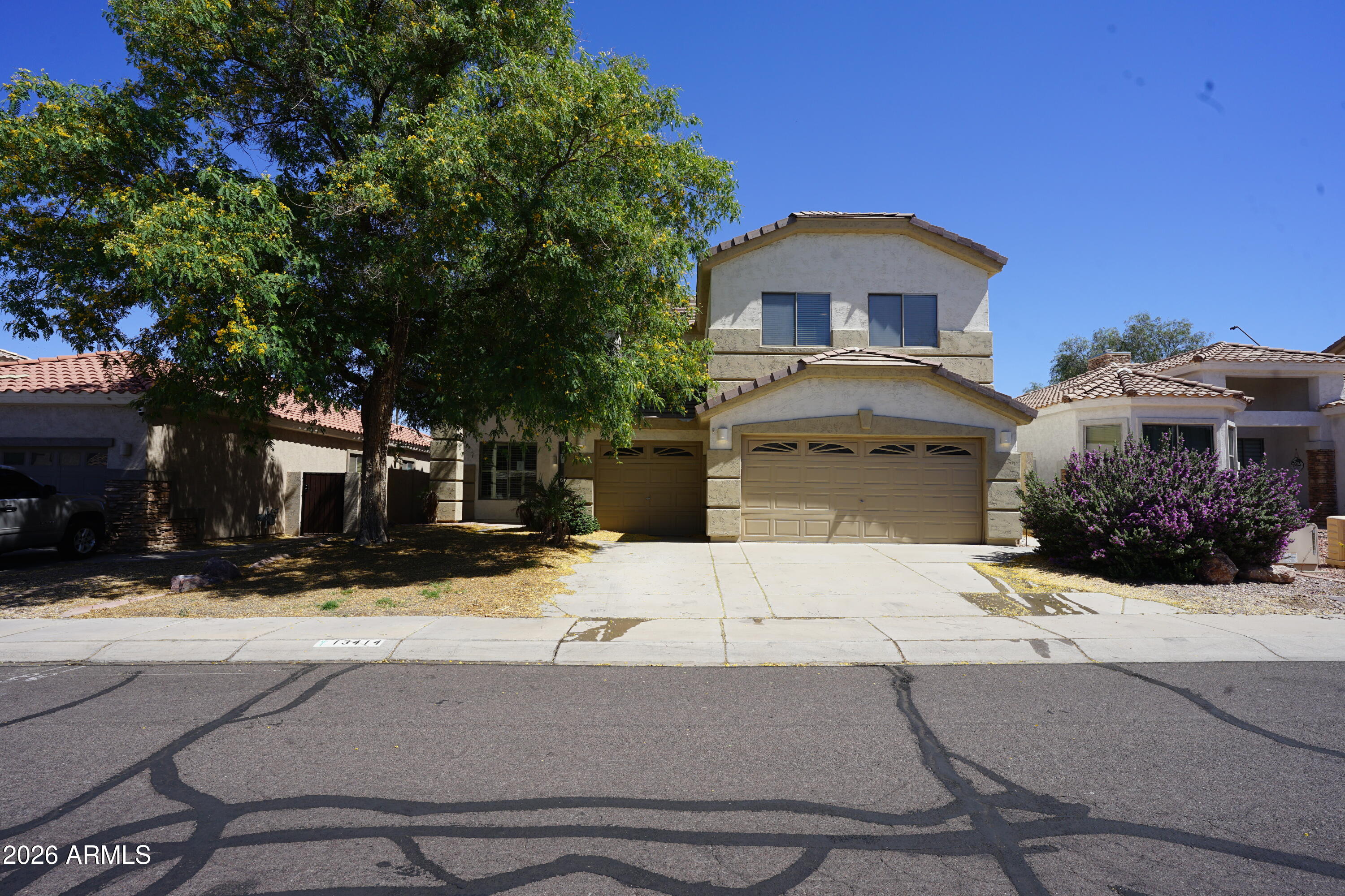 This two-story home features an open and functional floor plan with soaring ceilings upon entry and a unique split staircase design creating architectural character and separation between living spaces. The main level offers a formal dining area, spacious living and family rooms, a downstairs bedroom with full bathroom, kitchen with breakfast nook and sliding door access to the backyard, interior laundry room, and direct garage access. The second floor includes a large primary suite with vaulted ceilings, dual sinks, separate tub and shower, oversized walk-in closet, and private toilet room. Additional upstairs features include three secondary bedrooms, a loft area, and an extra-large bonus room suitable for a game room, media room, office, or flex space Exterior features include a private backyard with pool and ample outdoor space. Property offers strong potential with a spacious layout and versatile floor plan.