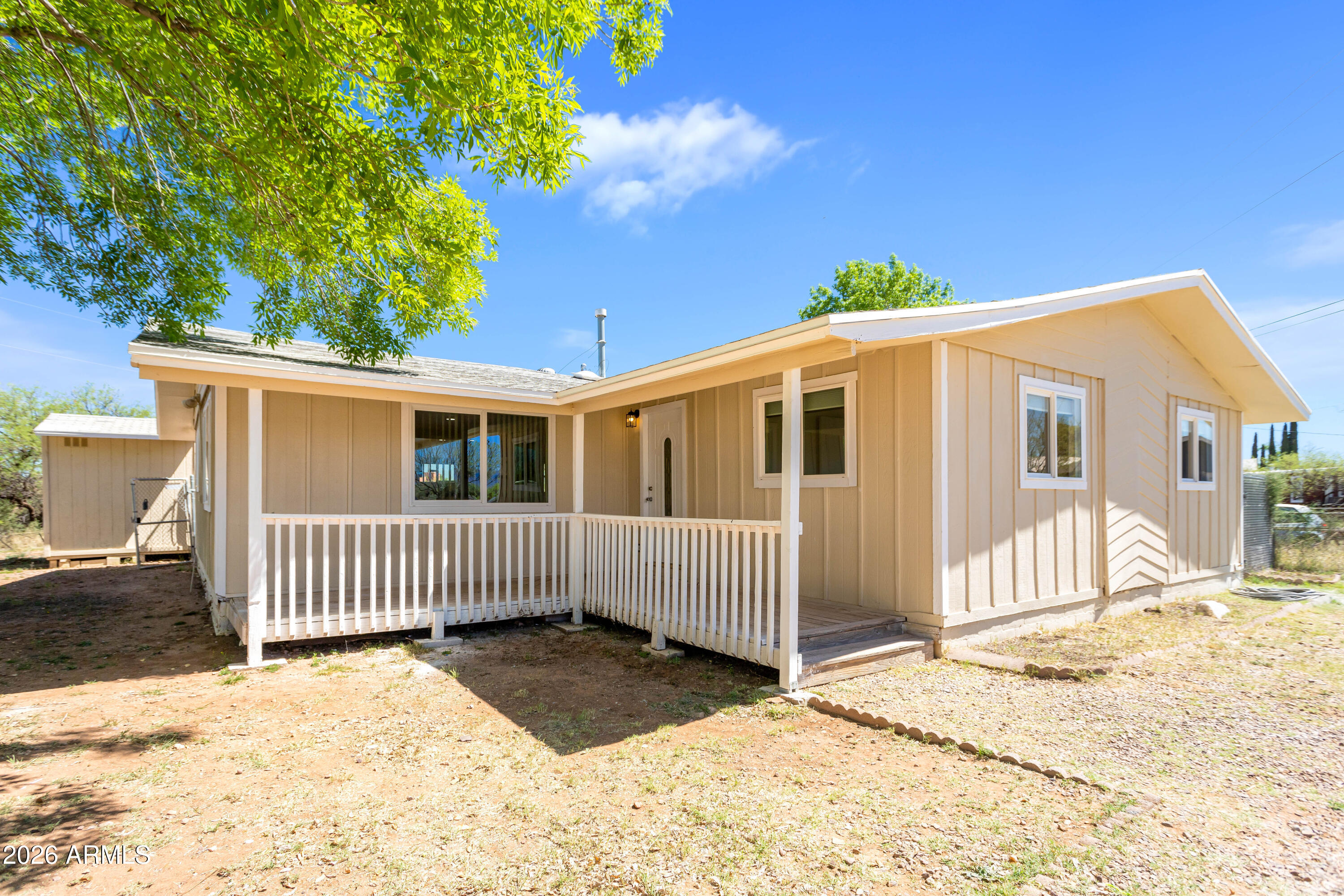 Charming, fully remodeled cottage-style home offering 4 bedrooms and 2 beautifully updated bathrooms, perfectly situated on a large, fully fenced lot. From the moment you arrive, you'll love the inviting curb appeal and adorable front porch--ideal for relaxing mornings or evening sunsets. Inside, the home features a bright, open floor plan that seamlessly connects the living, dining, and kitchen areas--perfect for both everyday living and entertaining. The stunning modern kitchen boasts brand-new cabinetry, sleek granite countertops, a spacious island, and plenty of storage. Both bathrooms have been tastefully remodeled with fresh, contemporary finishes. You'll also enjoy new carpet in the bedrooms and living room, along with durable vinyl plank flooring throughout the main living areas. Additional upgrades include new windows, a new heat pump for year-round comfort, and fresh interior and exterior paint--making this home truly move-in ready.Step outside to the expansive backyard, complete with a raised garden area, two storage sheds, and plenty of space for outdoor living, pets, or future projects.
This thoughtfully updated home combines modern convenience with cozy cottage charm--don't miss your opportunity to make it yours!