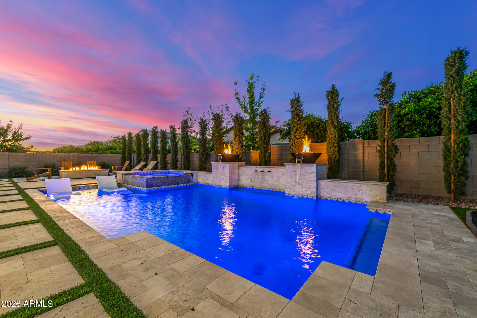 THE CROWN JEWEL OF MORRISON RANCH -- OVER $400K IN TOTAL UPGRADES!
A Custom Toll Brothers ''Haralson'' Masterpiece in Lakeview Trails

Experience the pinnacle of luxury in this meticulously refined estate. Combining Toll Brothers' architectural excellence with over $200,000 in custom backyard resort upgrades and a designer interior, this home is a masterclass in modern indoor-outdoor living.

A BACKYARD OASIS BEYOND COMPARE Step through a massive 20-foot multi-panel stacking glass door into a private $200K+ sanctuary:

Heated Pool & Jacuzzi: Featuring dramatic fire bowls, water features, and professional lighting.

Ultimate Outdoor Kitchen: Professional BUILT-IN GRILL and custom fire pit for the luxury entertainer.

Entertainment Ready: Integrated backyard sound system and lush premium turf.

Family Fun: Professional in-ground trampoline and low-maintenance landscaping.

Privacy & Style: Custom Roman shades and upgraded exterior coach lighting.

CHEF'S DREAM KITCHEN & INTERIOR REFINEMENT The heart of the home is a "Kitchen Elegance" showpiece featuring:

Pro-Tier Appliances: 48" Wolf gas rangetop (6 burners + griddle), double convection ovens, Sub-Zero refrigerator, and Microwave Drawer.

Exquisite Surfaces: Calacatta Quartz countertops, oversized island, and upgraded Oakcraft cabinetry.

Designer Touches: Custom light fixtures, 60" linear fireplace, and upgraded tile/carpet throughout.

PRIMARY SUITE RETREAT The oversized primary suite is a true sanctuary, boasting:

Secluded Private Deck: Perfect for morning coffee or sunset views.

Spa-Like Bath: Freestanding soaking tub, frameless glass shower with custom Dal ceramic tile, and Frost Quartz dual vanities.

Massive walk-in closet and ample space for a bright home office with tall, natural-light windows.

ELITE SYSTEMS & SMART TECHNOLOGY * Security & Tech: Fully installed SECURITY SYSTEM, Ecobee WiFi thermostats, and high-speed CAT-5 wiring.

High-Efficiency: Cathedralized spray foam insulation, tankless water heater with recirculating pump, and dual-pane Low-E windows.

Garage: Insulated Clopay doors with EV charging ports and 2x6 exterior wall construction.

Located within the iconic Morrison Ranch community and the highly-regarded Gilbert Unified School District. This is more than a home; it is a turnkey lifestyle.