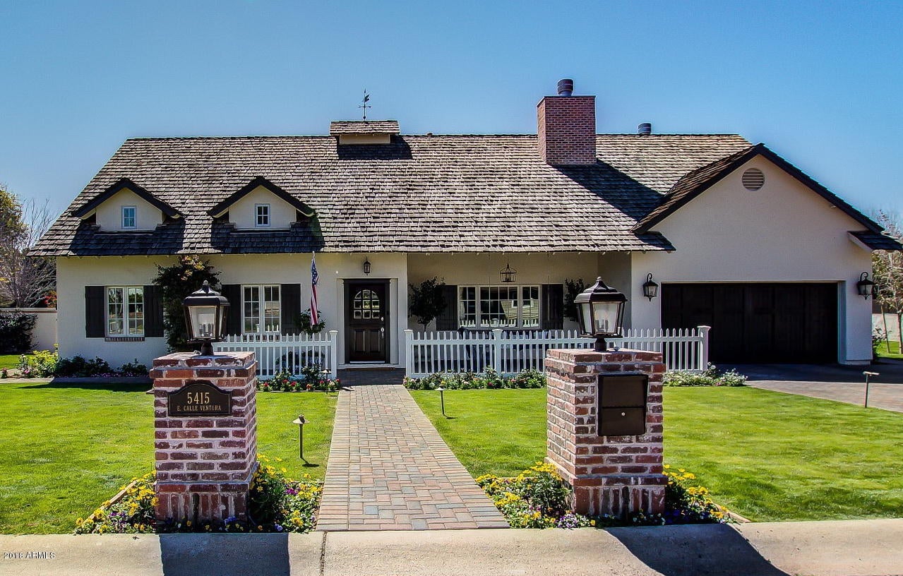 Just reduced! Inspired by an old English cottage, this charming story book home has so much warmth
& character.  Wonderful combination of spacious living spaces plus 4 bedrooms, 3 1/2 baths plus an office, master sitting room/study plus a wine room/pantry/possible mud room. (See floor plan).
Entirely re-built in 2006 from the ground up with extensive attention to detail including
over $100K in custom cabinetry, coffered ceilings, crown
moldings, etc. Wood floors, 10 foot ceilings throughout,
antique light fixtures, wood beams, Carerra marble &
soapstone counters, Sub Zero & Wolff appliances.  Lovely south facing
yard w/ covered patio, garden & room for a pool. Tesla charging port in garage. Located on a quiet street near
Hopi Elementary.