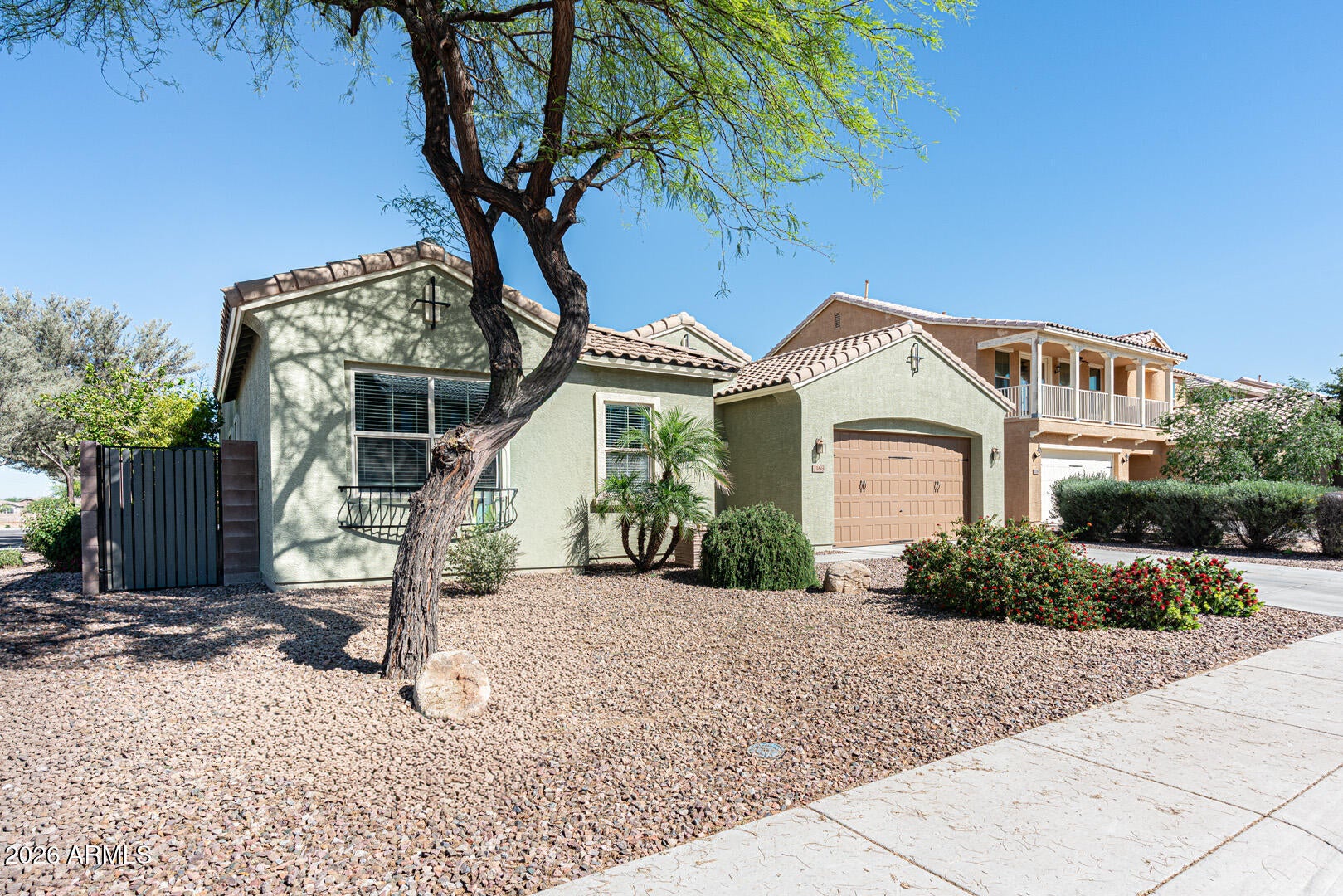 This is the kind of backyard buyers dream about.

Step outside and you'll find a 36' x 6' lap pool installed in 2024, perfect for starting the morning with energizing laps or unwinding with a peaceful evening swim. Surrounding the pool, lush landscaping creates a private and inviting atmosphere where Arizona outdoor living truly shines. Just steps away, a pergola with fan and lighting offers a shaded retreat -- the perfect place to relax with a good book, host friends, or simply enjoy the beauty of the backyard oasis.

Inside, the home offers generous living space designed for flexibility and comfort. With plenty of room to spread out, the layout easily accommodates everyday living, entertaining guests, or creating the ideal work-from-home office or creative space. Bathrooms have been refreshed with new faucets, adding a subtle modern touch.

For added confidence, the seller is providing a home warranty at closing.

Located in an area experiencing exciting growth, this property offers both space and opportunity -- making it an excellent choice for buyers seeking comfort, lifestyle, and long-term potential.
