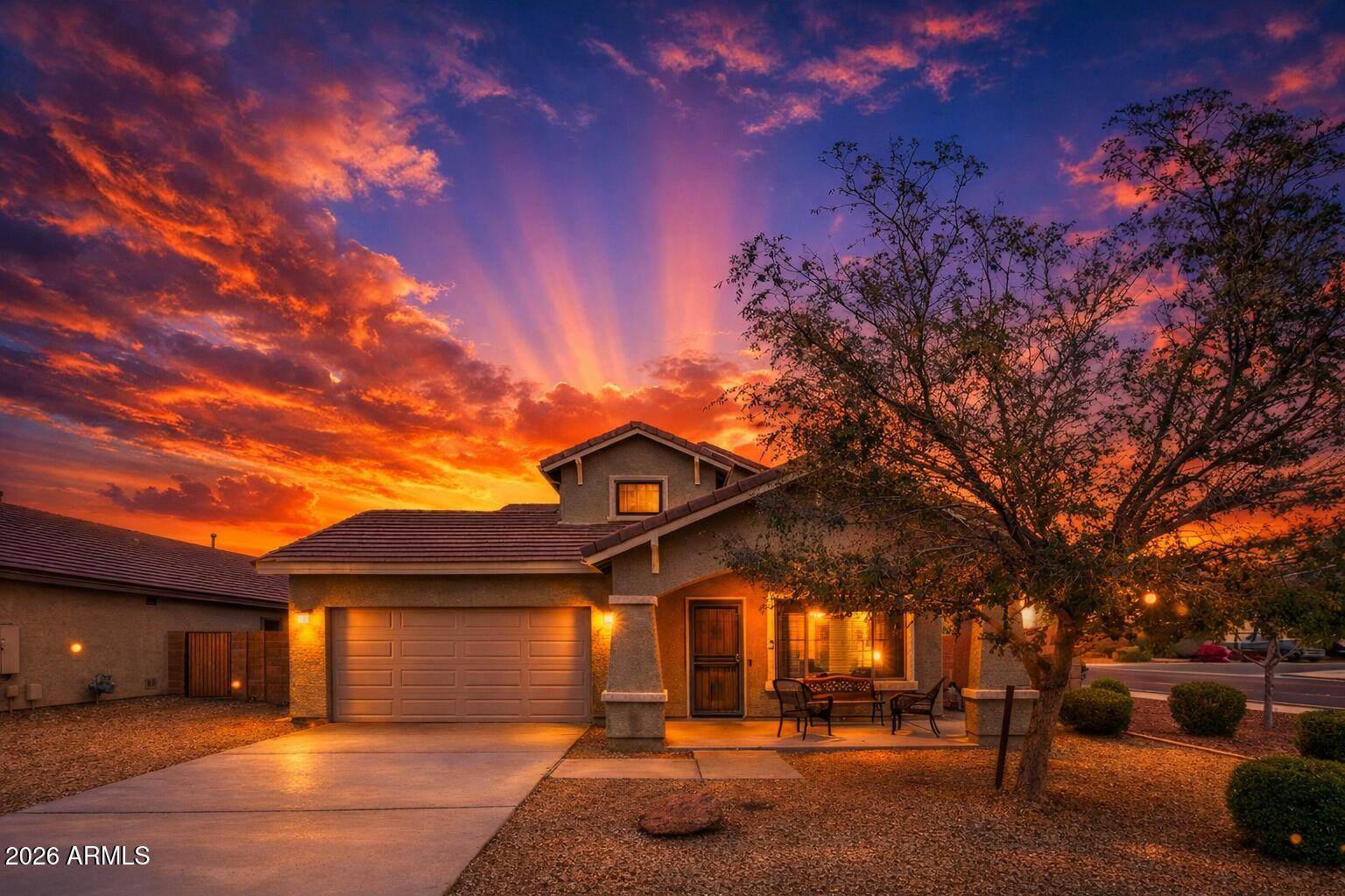 Rare 6-bed, 3.5-bath Litchfield Park home w/ dual primary suites & exceptional flexible living. The main-level primary suite features tile flooring & a spa-style bath w/ jetted tub & separate shower. The all-tile main level also offers a kitchen w/ gas cooktop, newer Whirlpool appliances (2025), & direct access to a private gated side courtyard w/ a gas-line Weber grill. Upstairs, a privately situated secondary primary suite is tucked beyond the loft & includes a sitting area or home office, spacious bedroom, & private bath. Fresh interior paint, two York AC units (2022 & 2023), gas tankless water heater, water softener (2025). Rare dual-suite floor plan offers outstanding flexibility for guests, live-work needs, or extended-stay living, close to parks, dining, & freeway access. Addition Information: 

This 6-bedroom, 3.5-bath home in Litchfield Park offers a rare combination of space, privacy, and flexibility with a highly desirable dual primary-style layout. Thoughtfully designed for multigenerational living, large households, or work-from-home needs, the home provides multiple private living zones while maintaining a cohesive flow. 

The downstairs primary bedroom features tile flooring and convenient access to a spacious primary bathroom with a jetted soaking tub, separate shower, and built-in cabinetry. Tile flooring extends throughout the entire main level, enhancing durability and ease of maintenance. The kitchen is equipped with a gas cooktop and newer Whirlpool appliances (2025) and opens directly to a private, gated side courtyard, creating a seamless indoor-outdoor living and dining space. The courtyard includes a gas-line-connected Weber grill, making it functional for everyday use as well as entertaining. 

Upstairs, a fully private second primary suite is separated from the loft by a door, creating a quiet retreat that feels tucked away from the rest of the home. This suite includes a flexible sitting or office area, a large bedroom, and a private bathroom with a shower, offering excellent separation for guests, extended family, or a dedicated workspace. 

Recent updates include fresh interior paint, two York AC units installed in 2022 and 2023, a gas tankless water heater, and a water softener added in 2025. All appliances convey, adding immediate value and convenience. 

The home is located near campuses within the Litchfield Elementary School District and Agua Fria Union High School District, with elementary and middle school options generally within approximately 1-2 miles and high school options within roughly 3 miles, providing flexibility for a range of household needs. 

Residents enjoy proximity to neighborhood parks, green spaces, and walking paths, supporting an active outdoor lifestyle. Shopping, services, and a variety of locally owned restaurants and cafés are conveniently located along nearby corridors, offering casual dining, takeout, and sit-down options without long drives. Entertainment, dining, and events are easily accessible at Westgate Entertainment District, while nearby access to Loop 303 and Interstate 10 provides efficient connectivity throughout the West Valley and greater Phoenix metro area. 

With its dual primary layout, private courtyard, gas cooktop kitchen, proximity to schools, parks, dining, entertainment, and major roadways, this home delivers everyday comfort, lifestyle appeal, and strong long-term livability.