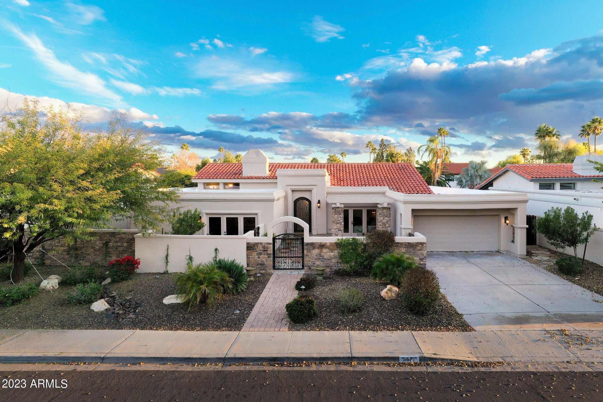 Come in and see this beautiful complete remodel in the heart of Scottsdale Ranch. No stone left unturned on this house with brand new Maple hardwood flooring throughout, pristine new Queen Beige tile in the bathrooms, and gorgeous kitchen cabinets. As you step into the backyard, you will see a resort style Pebble Tec pool, outdoor cooking, and a large area of artificial grass to fully encompass an entertainer's dream that is sure to impress. Attention to detail was paramount in this home and has already gone through a full home inspection. The Scottsdale Ranch Community is extremely inviting to any family, featuring amazing restaurants, community activities, and a peaceful canal that is perfect for those sunrise or sunset walks. Come and experience this perfect family home!