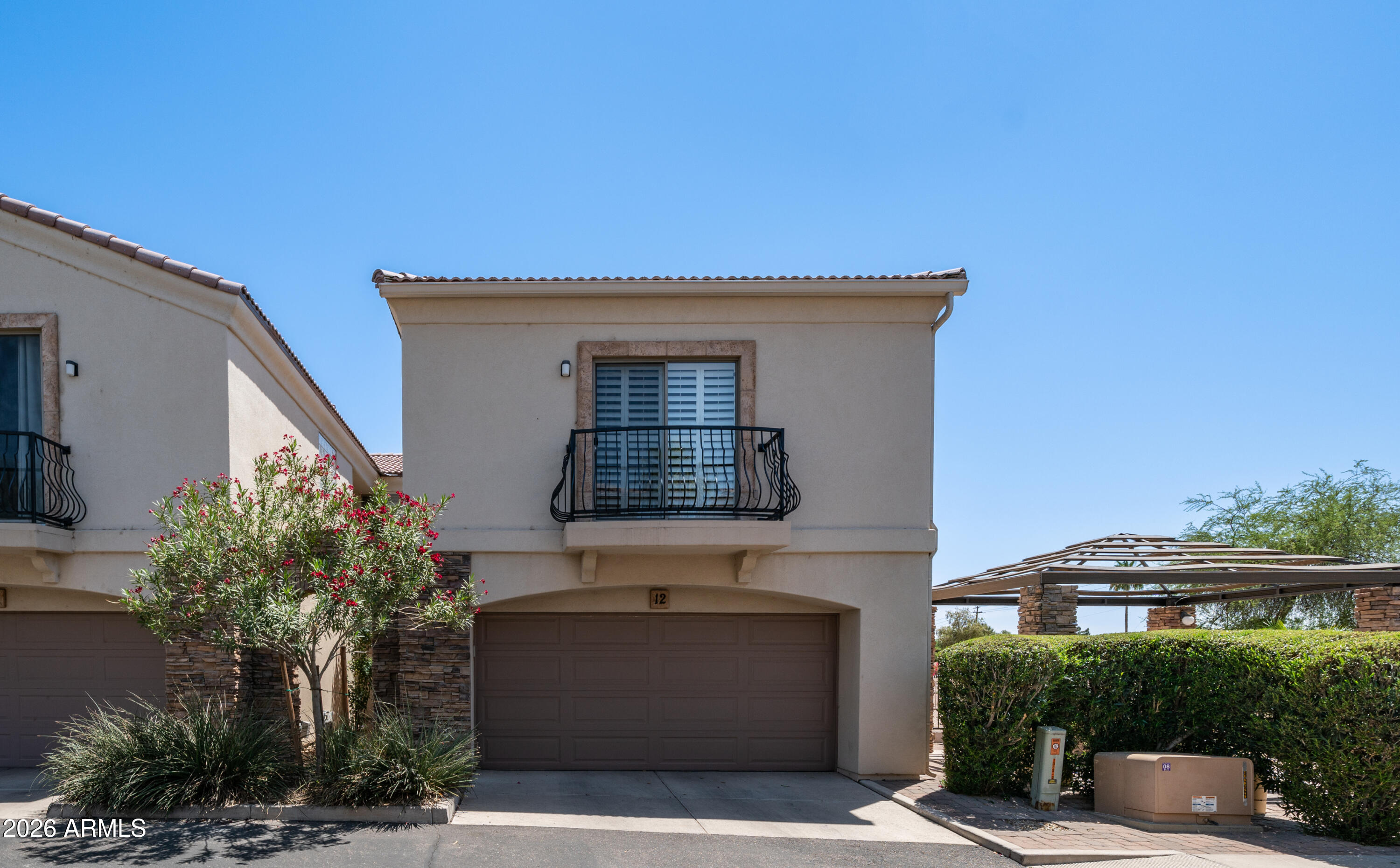 Charming private town home in the highly desirable area of Phoenix's uptown corridor. Mountain Views/ City lights!  Exceptionally maintained end unit offers bright open layout with abundant natural light, expansive kitchen and ample storage throughout.3 bed 2.5 bath. Floor to ceiling custom stone hearth gas fireplace. Loaded with upgrades and updates. HVAC 2019. Hot water heater 2018. Ozone filter air purification installed when duct work was sealed. Roof replaced 2026. Top rated schools in the Madison school district. Conveniently located near restaurants ,shopping, hiking/bike trails and easy freeway access. Perfect for full time living, a second home, or  investment property. Don't miss this great opportunity in this quiet enclave where units rarely become available, This is a must see!
