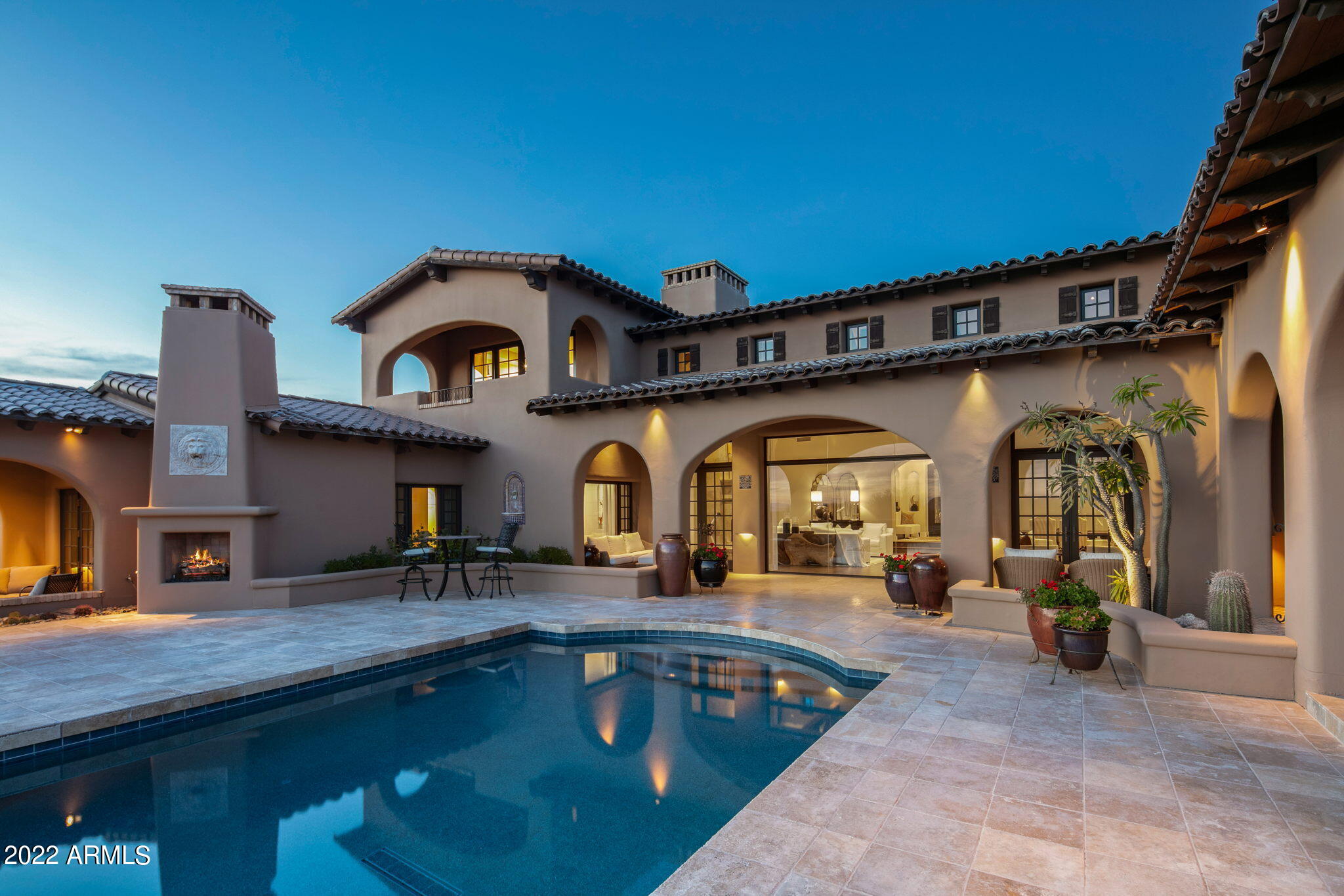 Truly a rare find, this gorgeous home sits on one of the best lots at Mirabel with spectacular views of the golf course and valley. Take in the breathtaking views of city lights and sunset while lounging outside under one of the many covered areas or by the sparkling pool. Extensive renovations include both the main home and casita kitchens, master bath, casita/media room/pool bathrooms, new wood flooring throughout, new front door, new garage door motors and springs, new roof in 2020, new driveway, new window coverings and so much more! This artist owned home has been meticulously designed down to every last detail and impeccably maintained. This home should make the top of every buyer's list for must see homes. Stunning beyond any words can describe.