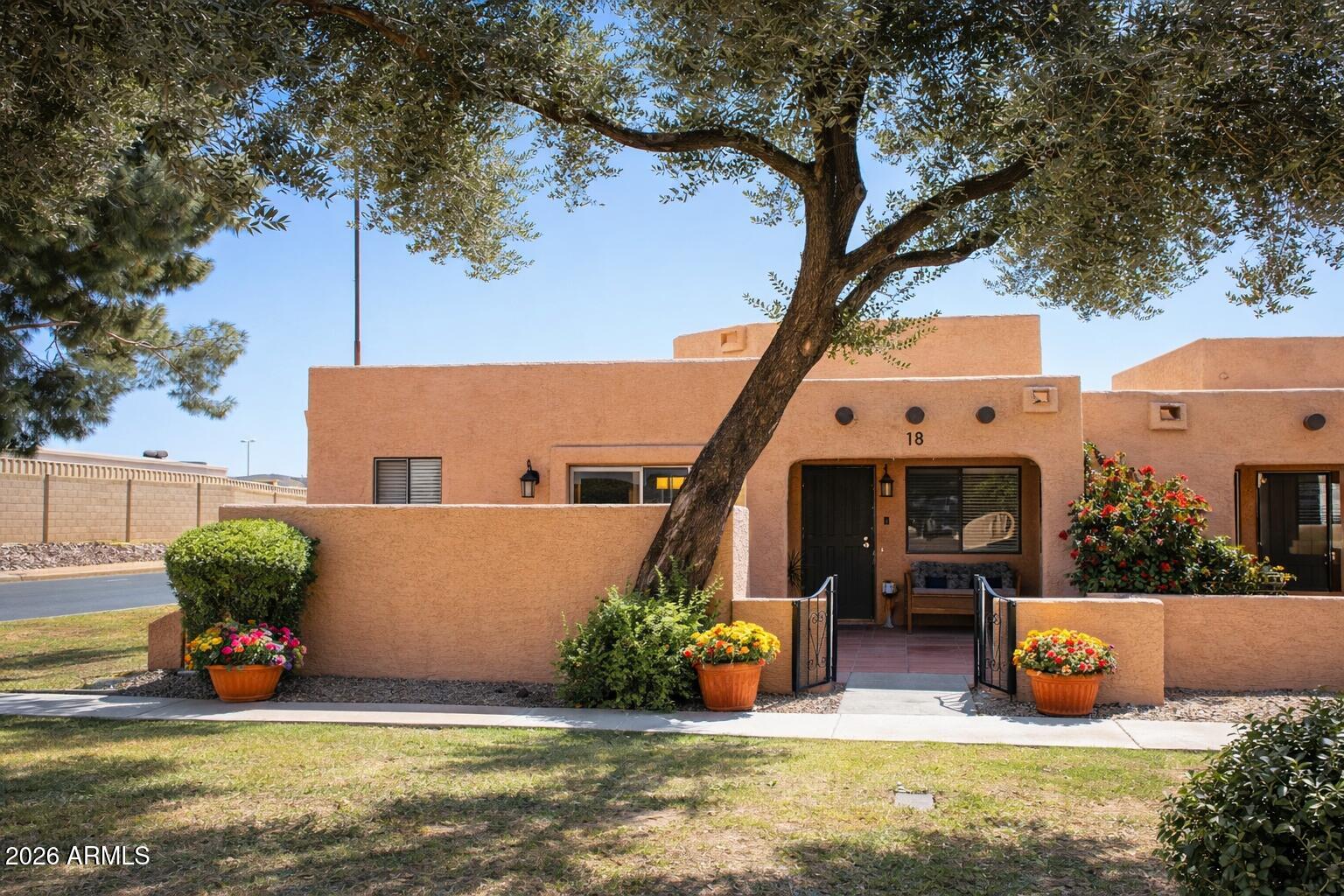 Beautiful end-unit townhome in the desirable Westgreen community located across from the pool and bordering the common area. This clean, move-in ready 2 bedroom, 2 bathroom home features vaulted ceilings, skylights, walk-in closets in both bedrooms, and a functional open layout.
Recently remodeled approximately one year ago with updated flooring, stainless steel appliances, primary bathroom updates, and new washer and dryer. Home is being offered fully furnished (including utensils) and includes covered parking, a small outdoor storage room, and quaint front and back patio sitting areas.
Conveniently located approximately 4 miles from State Farm Stadium, Westgate Entertainment District, VAI Resort, Desert Diamond Casino, and Topgolf.