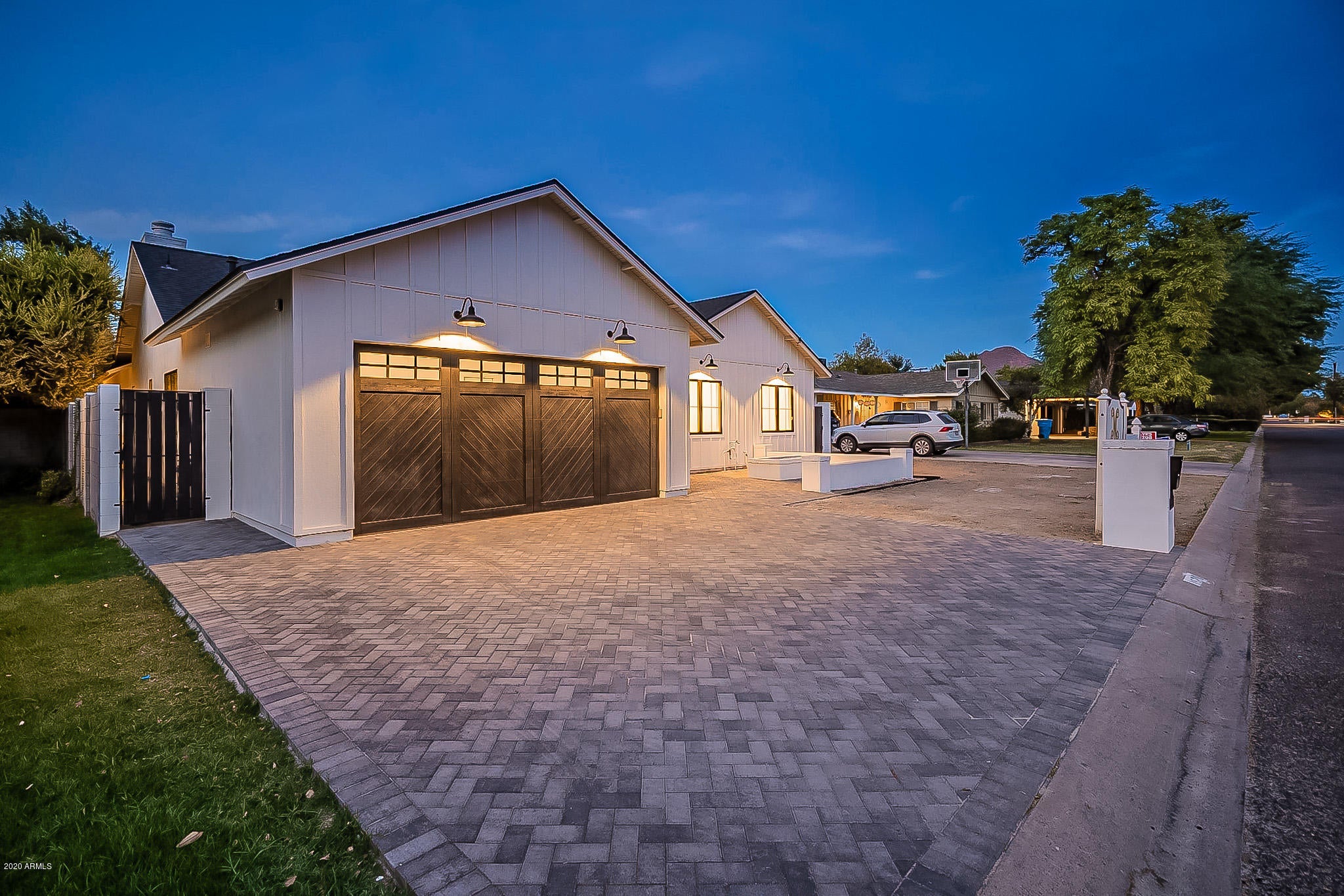 ***NEW CONSTRUCTION*** in the heart of Arcadia and ready to move-in. Custom built and specialized design by McIntyre Development. As you enter the oversized designer door you are greeted with an impressive entry and open style. Crisp & clean modern finishes are featured throughout the welcoming, light filled spaces. Every chef will adore the fabulous gourmet kitchen with striking custom quartz counters, Thermador appliances, convenient center island and intuitive layout, pared with custom cabinets and striking backsplash.  Live, relax and entertain with style in the gorgeous, open concept main living with built in wood burning fireplace and overhead wood beam.  Master suite includes steam shower, soaking tub and separate vanities and walk-in closets. Make this your home to be loved and admired for years to come. Gorgeous front courtyard with firepit complements the entry. This perfect location is 15 minutes from Sky Harbor Airport, your favorite sporting venues, Kierland, Scottsdale Fashion Square. Minutes from The Vig, Nook, LGO, The Porch & more fun restaurants in the evolving Indian School corridor.