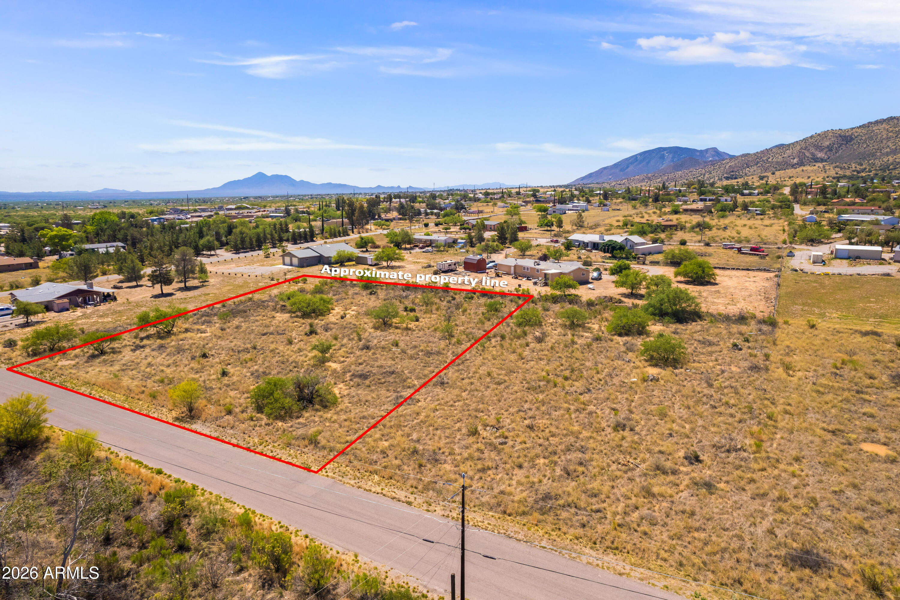 Build your dream home on this beautiful 1.01 acre parcel with stunning views of the Huachuca Mountains and nearby Carr Canyon Waterfall. This very buildable lot offers water at the property line with electric close by, making it an ideal opportunity for your custom home or future investment. Enjoy breathtaking Arizona sunsets, peaceful surroundings, and wide-open space while still being conveniently located just south of Ramsey Road and only minutes from town, shopping, dining, and amenities. A rare combination of natural beauty, convenience, and potential! There are 2 lots available side by side see MLS#7026619.