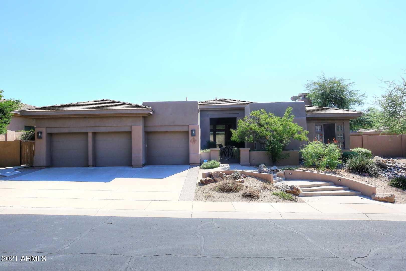 WONDERFUL HOME IN MCDOWELL MOUNTAIN RANCH. PREMIUM LOT, HIGHEST ELEVATION STREET IN THE GATED TROVAS COMMUNITY. AMAZING CITY LIGHT AND MOUNTAIN VIEWS. SPACIOUS- OPEN FLOOR PLAN W/LOADS OF NATURAL LIGHT. SPLIT MASTER SUITE HAS FIREPLACE, SITTING AREA AND REMODELED BATHROOM WITH LARGE WALK-IN CLOSET, GARDEN TUB AND WALK-IN SHOWER. HUGE LIVING/DINING ROOM WITH A WALL OF WINDOWS TO THE BEAUTIFUL BACKYARD. NICE OPEN KITCHEN TO THE FAMILY ROOM WITH FIREPLACE AND LARGE ISLAND FOR ENTERTAINING. TWO MORE LARGE BEDROOMS ON THE OTHER SIDE OF THE HOME, BOTH WITH EN-SUITE BATHS. ''DANTE'' FLOOR PLAN WITH EXECUTIVE LIBRARY/OFFICE OFF THE FOYER. SPECTACULAR OUTDOOR ENTERTAINING AREA W/ POOL, BUILT-IN BBQ, FIREPLACE AND MULTIPLE PATIOS ALL WITH CITY LIGHT VIEWS. THIS IS AN AMAZING HOME INSIDE AND OUT!