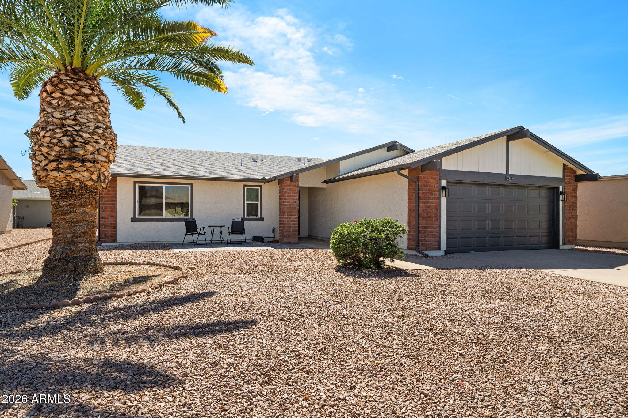 Welcome to this Beautifully Remodeled home with 2-Bedrooms, 2-Baths and a 2-Car Garage. Enter into an Open and Spacious Great Room with vaulted ceilings and dining area. The large Kitchen boasts new appliances, quartz countertops, a sizable  island with loads of storage, New Appliances, and a Wet Bar with storage and sink. The inside laundry has a wonderful stainless laundry sink, folding table area and cabinets. The Amazing backyard has pavers and beautiful ficus trees to provide a privacy wall...Great for Entertaining and right off of the kitchen! A newly epoxied Garage Floor! Ceiling fans throughout! New Vinyl Plank Flooring! Enjoy all if this in the Premiere Active Adult Community of Leisure World.