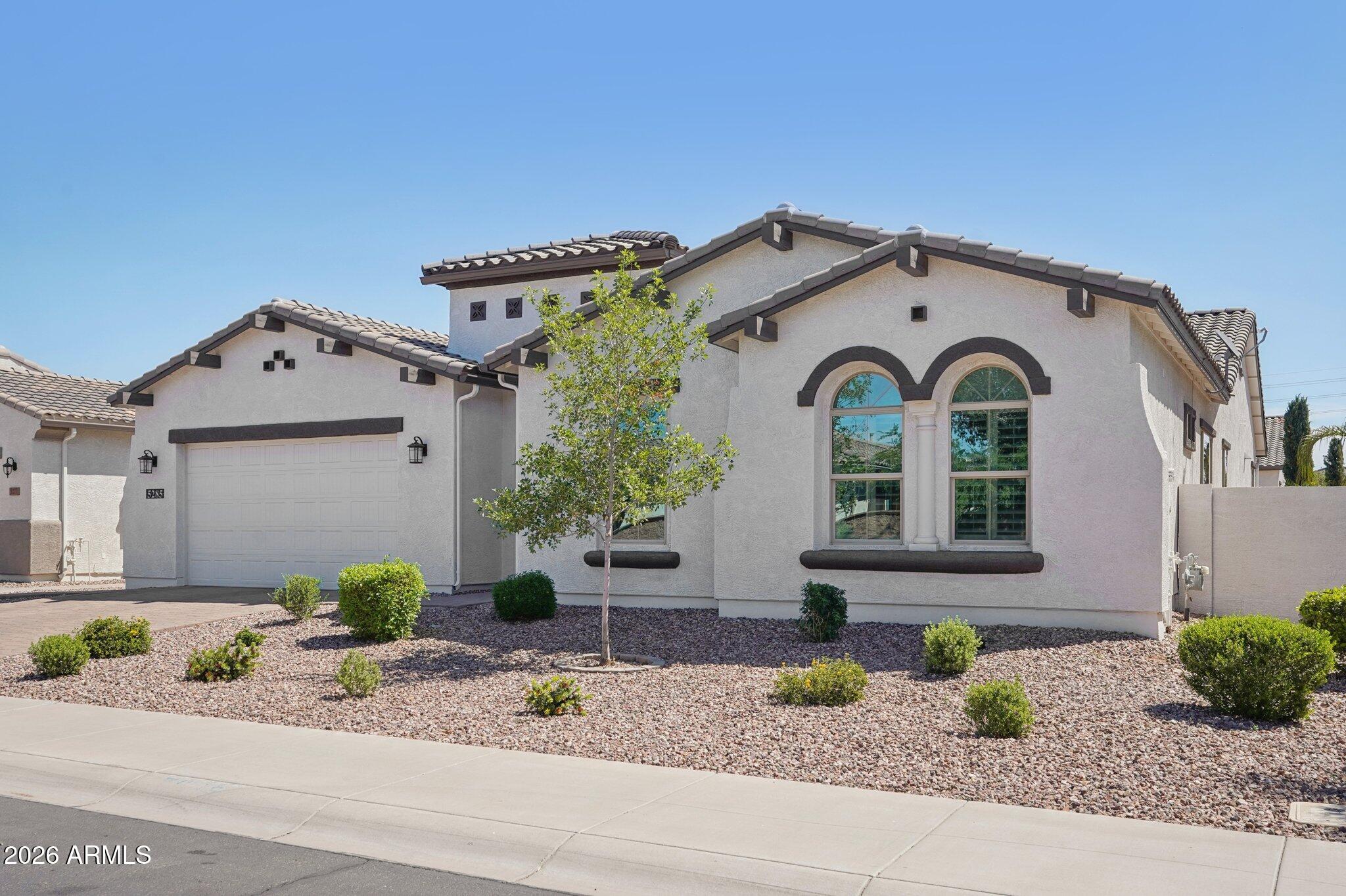 Spacious 4-bedroom, 3 bath home in The Bridges, one of South Gilbert's most desirable communities. This almost 3000 sq ft residence features an updated kitchen with quartz countertops, stainless steel appliances, and a center island open to the main living area. The oversized backyard offers room to entertain, play, or add a pool. A 3-car garage adds storage and flexibility. The primary suite includes a private en-suite bath alongside three additional bedrooms. The Bridges delivers tree-lined streets and a true neighborhood feel. San Tan Village is minutes away for shopping and dining. Gilbert, AZ 85298. The standout 3-car garage is a dream setup, featuring custom built-ins for organized storage and sleek epoxy flooring that adds both durability and a polished look, ideal for hobbies, a home gym, or simply keeping everything in its place.
Step outside and unwind in your own private retreat, complete with a serene outdoor water feature that creates a calming atmosphere, perfect for relaxing evenings or entertaining guests.
Beyond the home, the community truly shines. Enjoy access to beautifully maintained lakes, walking trails, playgrounds, and a splash pad, offering something for every stage of life, from morning walks to weekend fun.
If you're looking for a home that combines thoughtful upgrades with a peaceful, amenity-rich setting, this one delivers.