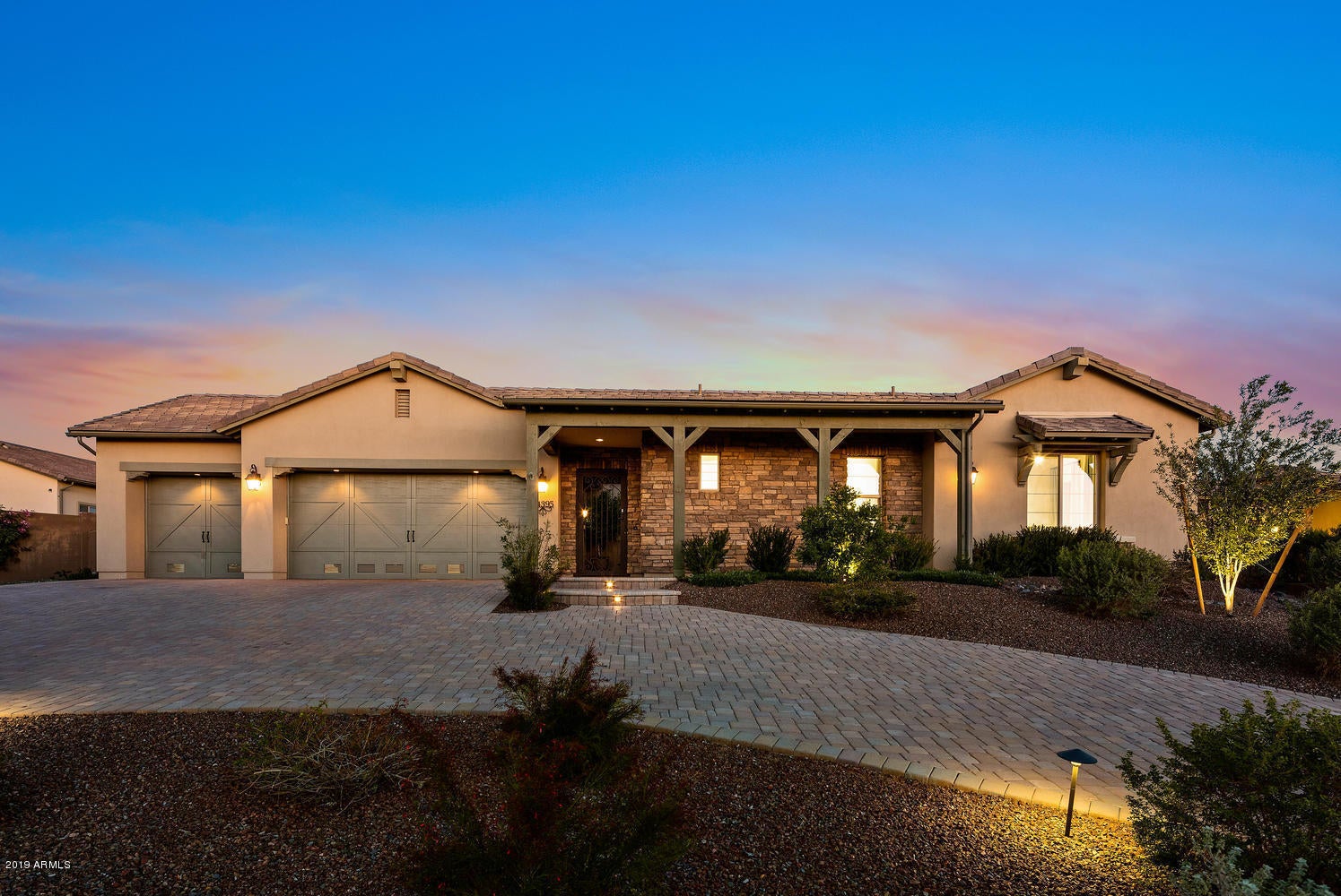 Impeccable home in the gated community of Bocara; built by Camelot. Home is situated on a premium lot w/ a circular entry drive, large backyard & mtn views. Private entry courtyard w/ detached guest casita & 3 bedrooms in the main house which are all en-suite. A Spacious Great Room floor plan with Chef's kitchen opening to family room & breakfast room that faces East allowing natural light to flow in. Stainless steel Dacor appliances in the kitchen with roll out drawers in the cabinets. Gas fireplace with quartzite slab hearth. Master bedroom was bumped out for more space & has French doors to the outside. The spa-like master bath has body and rain shower heads & luxurious bathtub. Office has custom built-in dual position desks.Incredible outdoor space with a large covered patio, a Ramada with 36" Lynx ceramic BBQ & sink, a 66 ft custom designed lap pool & heated spa as well as a gas fireplace. 3/4 Car extra wide & extra-long AIR CONDITIONED garage bays with floor to ceiling custom cabinets, built in work bench, sink & additional washer & dryer hookups. 10 ft. RV gates with storage access and a 10x10 storage shed tucked behind the garage.