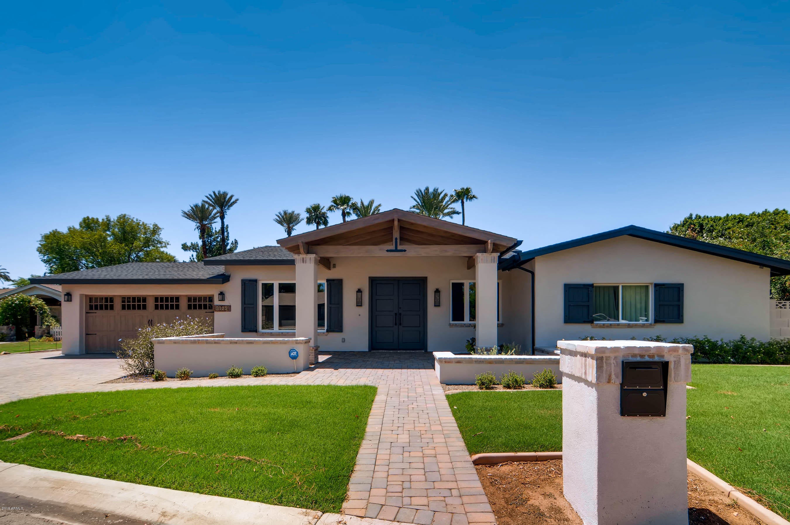 This home will rival any new construction on the market! Completely rebuilt in 2016! Stunning single-level ranch farmhouse in Lower Arcadia quiet cul-de-sac neighborhood!  Open great room floor plan with soaring 12' ceilings, rustic wood beams and white- washed red brick accents. Kitchen boasts large walnut center island, S/S appliances, 6 burner gas range and built-in wine chiller. Custom cabinetry throughout. Master suite is something to be desired with dual marble vanities, large jacuzzi tub, steam shower, luxurious his/hers closets and private exit to the backyard oasis. Three guest suites are located on the opposite side of the home plus a beautiful office and media room with raised theater seating for 8. Open Great room offers expansive sliding doors open up to a Resort Style- backyard! Large, covered patio, built-in BBQ area, exterior sound system, heated pool, and jacuzzi make this the house for entertaining! Tons of open grassy areas for kids to play! One of the largest lots in the community, and comparable to Arcadia Proper! Don't miss out on this hidden Gem!