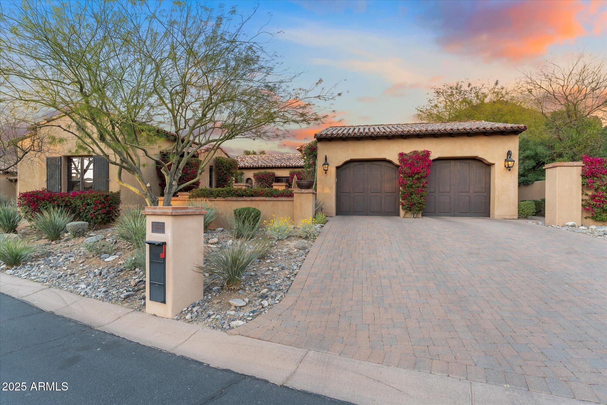 Located in the prestigious Horseshoe Canyon at Silverleaf, this highly sought-after Silverleaf Casita offers an exceptional blend of luxury, privacy, and convenience in one of Scottsdale's most exclusive guard gated communities. Situated on a prime, secluded lot adjacent to the Silverleaf Club and Spa, this fully furnished, turnkey residence is just moments from world-class golf, fine dining, and premier amenities.
Enter through a privately gated courtyard into this immaculate, single-level home with no stairs, where every detail has been meticulously maintained. Spanning 3,337 sq. ft., the home features 3 bedrooms, 3.5 baths, authentic Spanish architecture, a spacious open floor plan, and an oversized detached guest house, perfect for hosting guests in comfort and style or perfect for a private home office. Designed for the discerning entertainer, this home boasts a temperature-controlled wine room, a gourmet kitchen with high-end appliances, and brand-new motorized window coverings that enhance its sophisticated design. Enjoy the Arizona's finest of outdoor living with the expansive outdoor spaces that include a large heated saltwater pool and spa with serene water features, a cozy fire pit and a fabulous outdoor kitchen all set against the backdrop of breathtaking views of the McDowell Mountains and a private desert preserve. With its low-maintenance design, this property is the perfect lock-and-leave retreat, offering effortless living in a secure, prestigious setting. As an added benefit, the seller will consider a seller carry, providing a unique opportunity for buyers seeking flexible financing options. This Silverleaf Casita is a rare opportunity to own a coveted residence in one of Arizona's most desirable enclaves, offering ultimate privacy, luxurious upgrades, and an unbeatable location. Ideally located to Scottsdale's finest shopping, dining and 101 Freeway.
