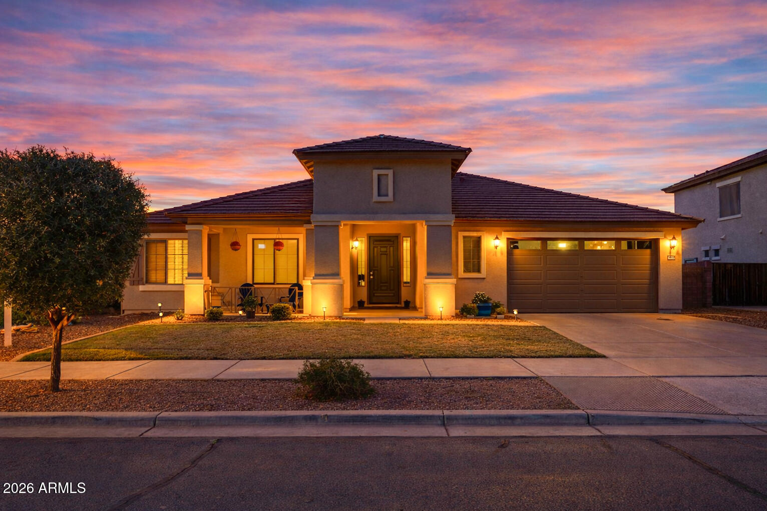 NEW ROOF BEING INSTALLED!  Ideal location! On the border of Gilbert with easy freeway access straight up Power Rd! Light, bright, and freshly painted exterior! This move-in-ready gem features 2x6 construction and a grand oversized front door. Inside, the 10-foot ceilings create an airy, custom feel throughout. The split floor plan offers 4 spacious bedrooms plus a versatile den--ideal for a home office, playroom or flex space.  At the heart of the home, the gourmet kitchen boasts white shaker cabinets, granite countertops, and premium stainless appliances, flowing seamlessly into the expansive great room. Step outside to a lush backyard with green grass and an oversized patio, perfect for enjoying a cup of coffee under the Arizona sun. Located just minutes from the shopping and dining!