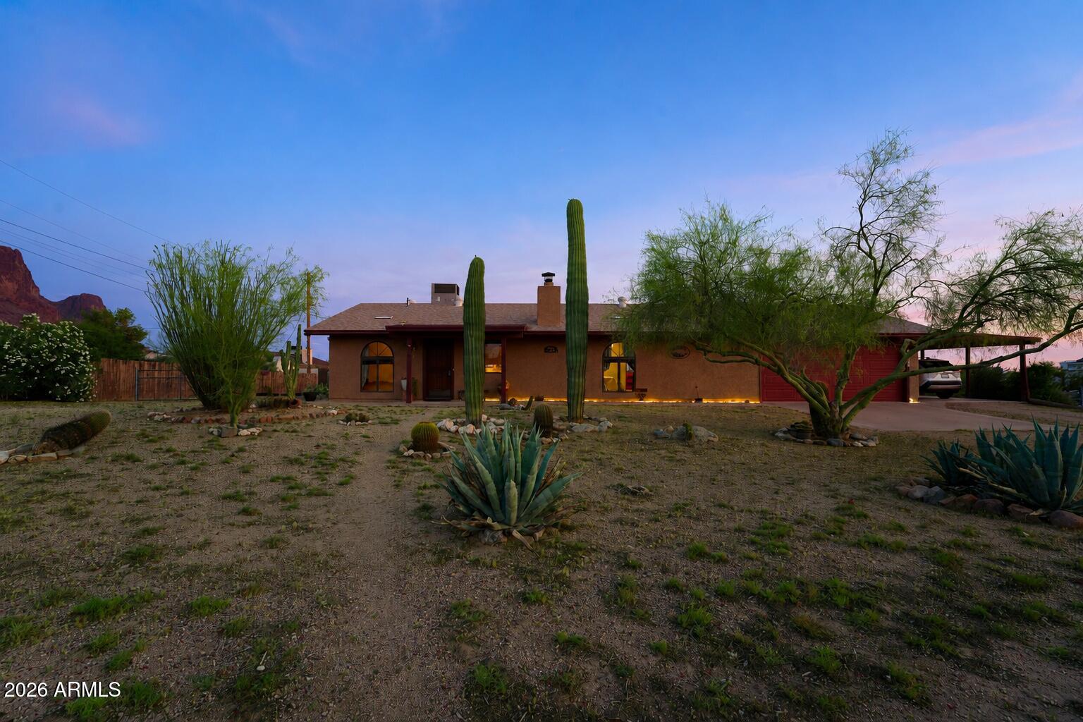 Nestled in the scenic desert landscape of Apache Junction, this unique 1.25-acre horse property offers a rare opportunity to own a slice of Arizona's most iconic terrain. Located at the base of the legendary Superstition Mountains, this home is surrounded by breathtaking 360-degree views that truly set it apart.
Wake up to stunning sunrises over the Superstitions to the east, enjoy the rugged beauty of Four Peaks to the north, take in the serene presence of the San Tan Mountains to the south, and unwind each evening with unforgettable Arizona sunsets to the west.
Situated in a peaceful rural acreage community where properties range from one to five acres, this modest home offers privacy, space, and endless potential. Whether you're looking to create your dream horse property, a desert retreat, or simply enjoy wide-open living, the setting alone is truly priceless.
Priced to sell, this is an exceptional opportunity to secure incredible views, usable land, and a highly desirable location at an outstanding value.
