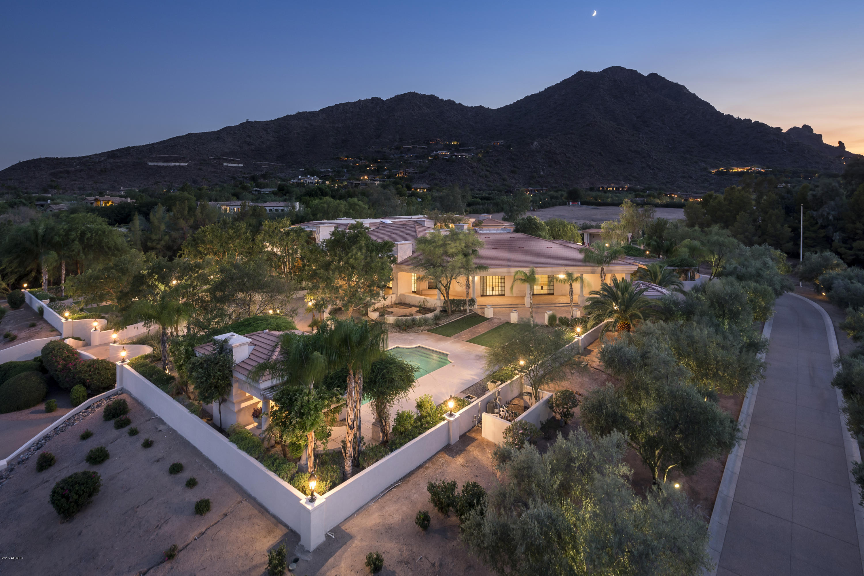 PARADISE VALLEY’S MOST EXCLUSIVE LOCATION!*THIS 5-ACRE GATED ESTATE IS LIKE A SCENE FROM THE GREAT GATSBY*STUNNING CAMELBACK MOUNTAIN VIEWS*OVER 15,000SQFT OF PURE LUXURY FINISHES*GRAND FOYER*SOARING CEILINGS*FORMAL LIVING & DINING ROOM*GREAT ROOM*FAMILY ROOM W/WETBAR*EXECUTIVE OFFICE*LIBRARY*MEDIA/GAMEROOM*GOURMET KITCHEN W/BUTLER’S PANTRY*GRAND MASTER SUITE*HIS/HER MASTER BATHS RESEMBLING A SPA RETREAT WITH A WALK-OUT ZEN PATIO*GIGANTIC HIS/HER CLOSETS*EXTENSIVE WOODWORK & CROWN MOLDING*DECORATIVE COLUMNS & MARBLE FLOORS*CATHEDRAL DOORS*ELEVATOR*12 FIREPLACES*2 BEDROOM GUEST HOUSE PERFECT FOR MULTIGENERATIONAL FAMILIES*TENNIS COURT*ELEGANT RESORT BACKYARD W/LARGE POOL,WATER FEATURE,GAZEBO,FOUNTAINS,POOL BATH,BBQ,& GRASS AREAS*THIS IS ONE OF THE FINEST ESTATES ON THE WEST COAST!!!!