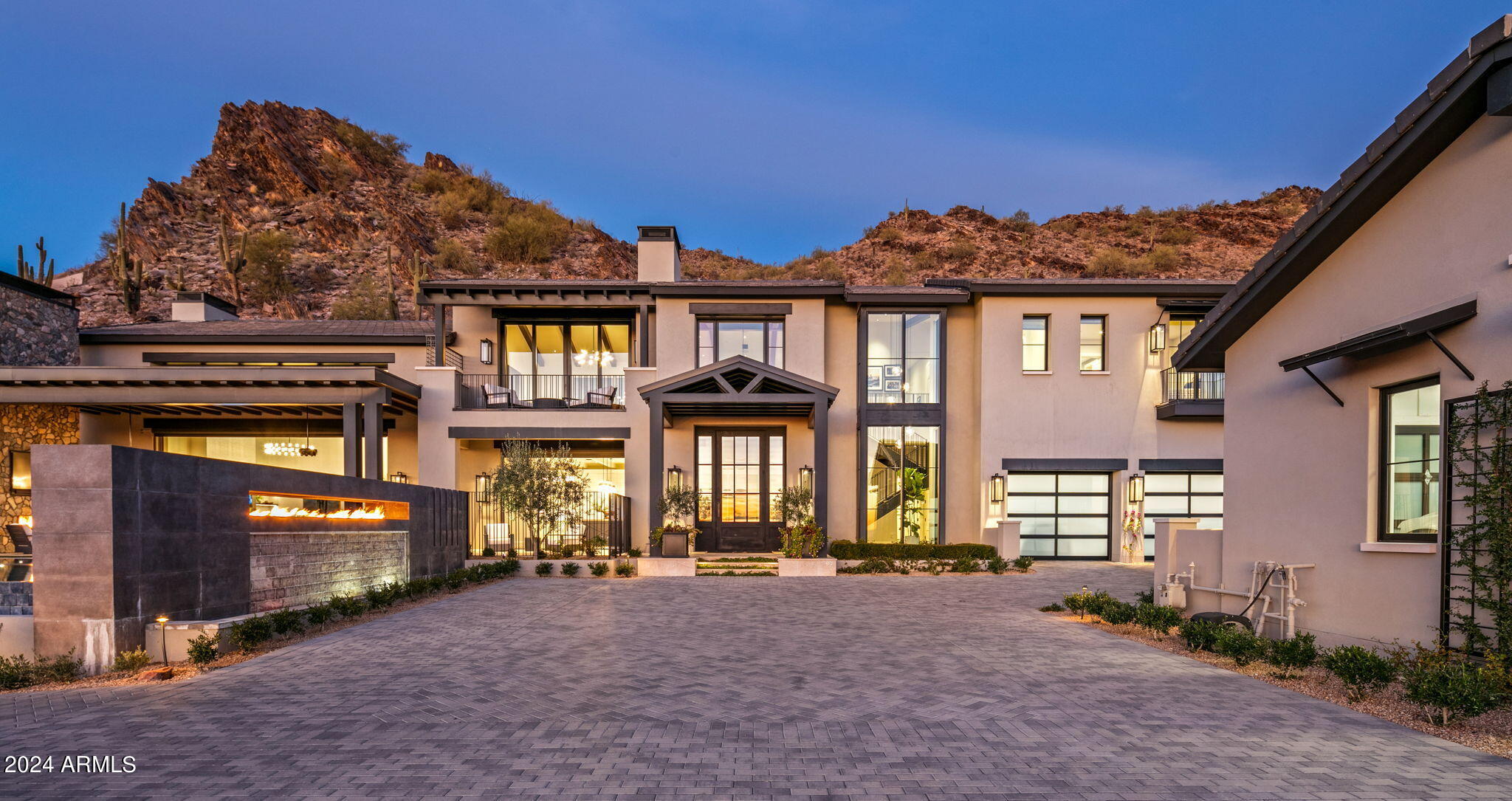 The BEST sunset and city light views in Silverleaf at this privately gated 4.8 Acre estate. Recently finished in 2021, this home features 4 bedrooms, 6.5 baths, office, game room, 4 car garage (could be 6 car with lifts). First floor includes Owner's Suite, exercise room, office and separate guest house. Second level includes 2 ensuite beds/baths plus large game room and half bath. Built for entertaining, the kitchen is open to the great room with a swing door butler's pantry, Wolf and Subzero appliances and overlooks dining area. The great room features multiple seating areas, fireplace, large 1000+ bottle wine cellar and wet bar. Outdoor paradise includes negative edge pool and spa, multiple firepit/place seating and built-in heaters. The views are unlike any other in the community!