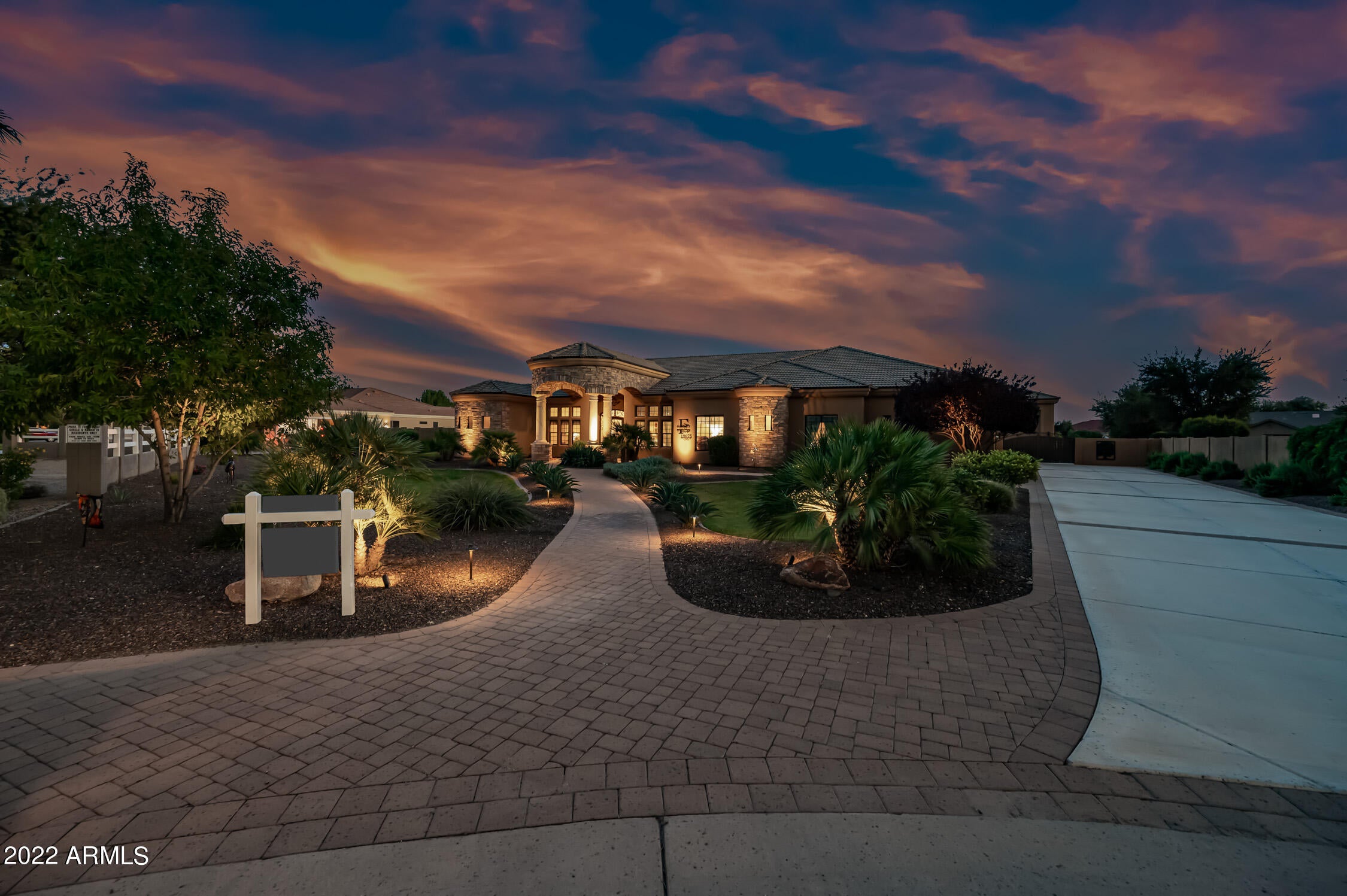 Come and check out this Gorgeous 2008 Custom built home in the ever so popular subdivision of Circle G.  It's tucked away on a cul-de-sac lot on nearly an acre with an extended driveway.  This home shows so much pride of ownership and the sellers have taken really good care of it!!  The tour starts with a luxurious grand entry and leads you to the large and open Chef's kitchen with granite countertops, upgraded kitchen cabinets with crown molding, stainless steel appliances, wall ovens, a massive breakfast bar, center island with a built in ice maker, pot filler, walk in pantry, pendant lighting and built in recycle bins.  There are 5 bedrooms in this split bedroom floorplan, with one of the bedrooms next to the primary bedroom, so it would be great for a nursery or a den with the double doors.  Of the guest bathrooms two of them have beautiful walk in showers and the primary grand bath has a walk "through" shower, 3 shower heads and jetted tub, dual sinks and a wonderful walk in closet!!  In addition to the 5 bedrooms there is a nice size Media room with a lighted Tray ceiling.  There is a huge laundry room with tons of shelving, cabinetry and jet sink/spa for the fur babies!  Off of that room is another large storage room as well as great storage throughout this entire home!  The backyard is a oasis comprised of a very large covered patio, built in BBQ, desert landscaping with Orchard, heated pool/spa with boulder features and baja area in the pool (solar pool cover too)!   There is an epoxy coated, 4 car garage attached to the home and another 4 car epoxy coated garage or use it for your RV building that both garages come with highly upgraded cabinets along with walls!  The RV garage is behind a gate too!  Throughout the home you have Tray ceilings, Travertine tiled floors, upgraded lighting fixtures, ceiling fans and raised panel doors. Recent improvements and replacements include the following:  2019, a new flat roof (there are drop down stairs to access), new water softener, garage plumbing, yard irrigation (programmable Rachio system), dining room Chandelier, rain gutters, pool filter system, Pool heat pump and pool software (computerized controlled with smart phone).  2021, Landscape lighting and garage exterior lighting, 2022, Family room carpeting, TruGuard filer for the pool and a new 4 ton 17 SEER HVAC system.  Every door that leads to the pool has child safety features and there is a horse trail that is behind the house!!  The community has walking paths and children's play area.  SO many awesome features, don't miss out on this one!