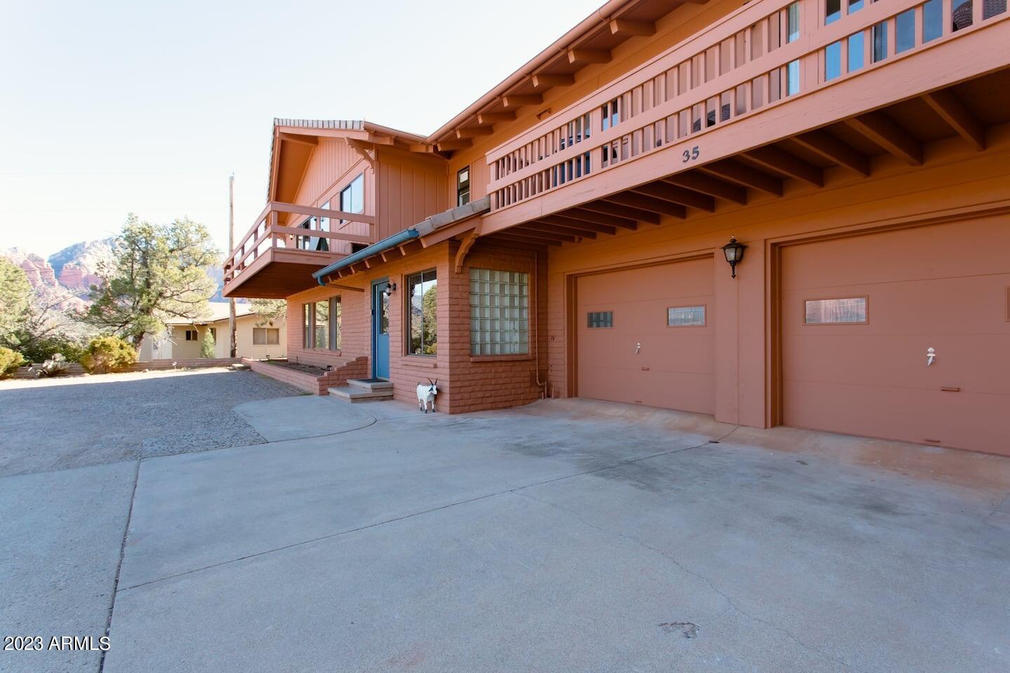 Incredible Views* Prime Location* Unbeatable Income! Ideally situated behind Sedona's landmark Tlaquepaque Arts & Shopping Village/Resort sits this unbelievable Cash Cow with breathtaking Red Rock views.  This highly performing Airbnb TriPlex brings in (over $200k gross)  comes complete with full furnishings as shown for immediate return.  Sitting atop in a quiet residential neighborhood provides ''the best of everything''; just minutes from downtown Sedona & hiking trails. Separately entranced & individually climate controlled, each unit has essentially stocked kitchens, designer finishes & private outdoor spaces. 1 space per unit outside parking+2 car garage, storage room & laundry on site. Low maintenance landscape, Pitched Tile Roof, Comm Tankless h20heater & Wifi services all unit.