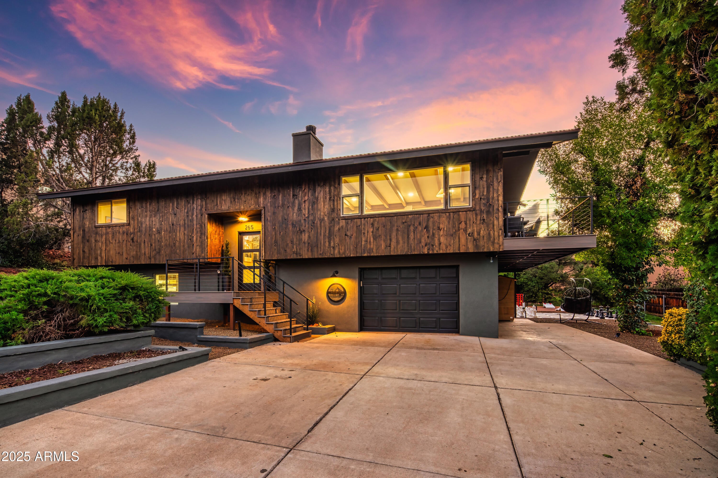Reimagined with soul — new roof, windows, HVAC, Trex decking, siding & stucco create a flawless canvas. Inside, interiors that steal your breath: a chef's kitchen with waterfall countertops where morning coffee feels sacred, spa bathrooms designed for pure escape, luxury finishes that make leaving impossible. Your $60K private outdoor resort awaits outside—soak under stars in the hot tub, find stillness in the sauna, or gather at the firepit. Play and connect on the putting green, life-size chess board, and game area. Kids discover their secret speakeasy hideaway while you sink into curated furnishings wrapped in Cabin 265's signature touches—plush robes, branded mugs, thoughtful details everywhere. (See more...) Looking to get a property into service ASAP for 2025 tax benefits or have a 1031 exchange that you need to act fast on? 

This home is proudly branded as "Cabin 265", celebrating its modern-cabin luxury aesthetic. Every detail reinforces the brand -from embroidered robes and branded coffee mugs to custom entry mats, pillows, and décor accents - creating a cohesive, boutique-resort identity that guests instantly recognize and remember.

EXTERIOR UPGRADES
- New Roof with long-life, high-performance materials
- New Windows & Doors throughout for improved energy efficiency and contemporary styling
- All Decks Rebuilt with durable Trex composite decking
- New Siding & Stucco for a clean, modern exterior finish
- $60,000 Landscape Package featuring:
- Custom fire-pit lounge area
- Hot tub with privacy screening and mountain-view setting
- Outdoor sauna for the ultimate spa-style relaxation
- Dedicated game area for family fun
- Putting green and life-size chess board for interactive entertainment
- New turf, hardscape, and lighting for a resort-like ambiance


INTERIOR UPGRADES
- New Flooring installed throughout the home
- Fresh Interior & Exterior Paint in designer color palettes
- All-New Lighting Fixtures creating a warm, cohesive glow
- New Electrical Receptacles & Switches throughout
- New Plumbing Fixtures in every space

KITCHEN AND BATHROOMS
- Completely New Kitchen with custom cabinetry, waterfall-edge countertops, and all-new high-end appliances
- Fully Renovated Bathrooms with luxury vanities, designer showers, and upgraded toilets for a spa-inspired atmosphere

MECHANICAL SYSTEM
- Brand-New HVAC System ensuring reliable, efficient comfort in all seasons

LIFESTYLE AND DESIGN FEATURES
- "Speakeasy" Kids Game Room - a hidden, themed entertainment space for family enjoyment
- All-New Indoor & Outdoor Furniture professionally curated for comfort and style
- Fully Turnkey Offering  includes all furniture, décor, kitchenware, linens, and everyday essentials

One seller is a licensed real estate agent in the state of Arizona.