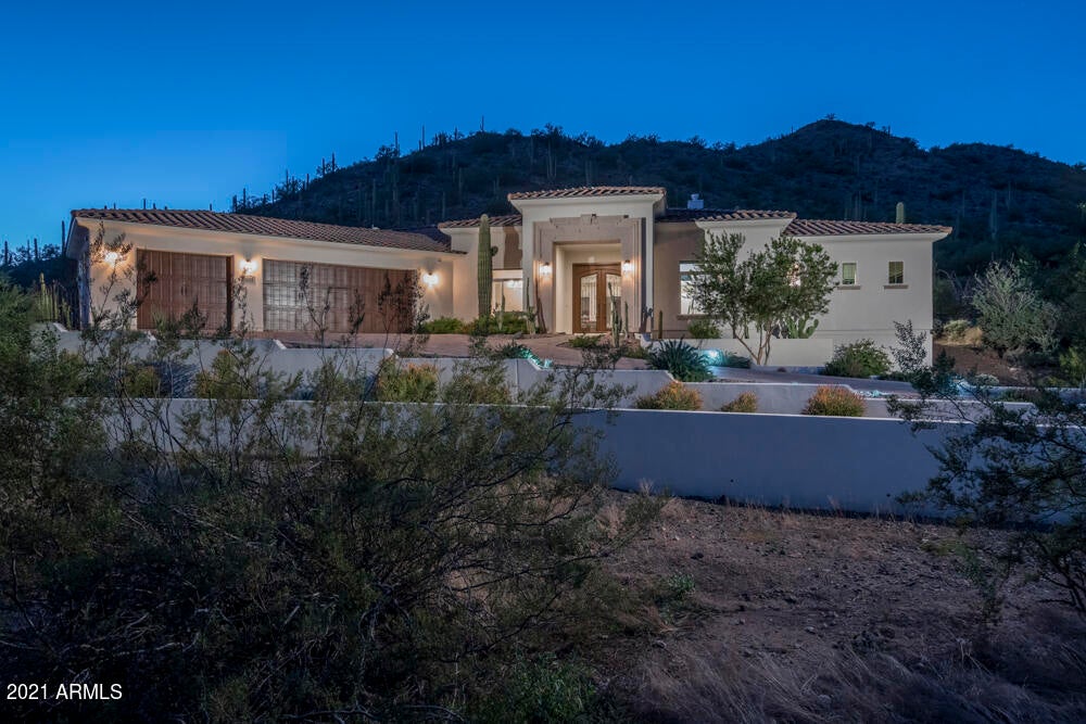 Newer 2018 built custom home situated hillside on over 3/4 of an acre with Black Mountain views.  Large open living space plus a formal dining area.  Gourmet kitchen with large island, granite counter tops, gas cooktop, stainless steel appliances, double wall ovens, breakfast bar and nook, additional sink, loads of cabinet space, and a butler's pantry. Preferred split bedroom floor plan, Master bedroom with its own access to yard, motorized shades and luxurious bath offering multi-head shower, bathtub, dual sinks, split vanities, private water closet, & walk-in closet.  Limestone & marble flooring in all the right places. Big laundry room w/sink. Oversized 3 car garage w/storage cabinets. Private yard w/expansive patio, pavers, elevated pool & spa, heated outdoor shower plus views!