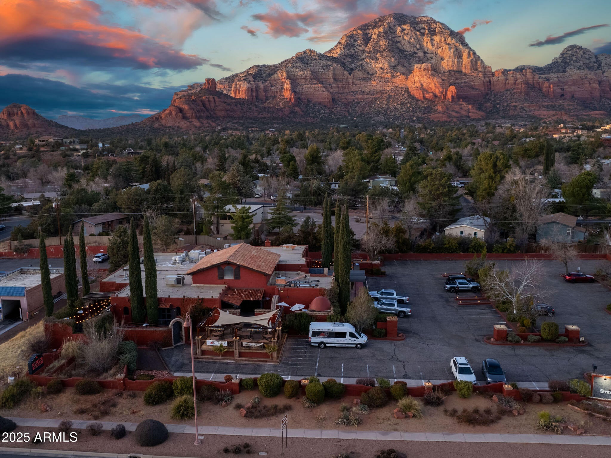 This is a rare opportunity to acquire a prime commercial property in one of Arizona's most sought-after locations. Whether you're looking to expand your business presence or invest in a high-potential development project, this property offers the foundation for success. Situated right on 89A in West Sedona with 99 parking spots-an unbeatable location! The floor plan is incredibly spacious and varied with 4 distinct outdoors spaces/patios.