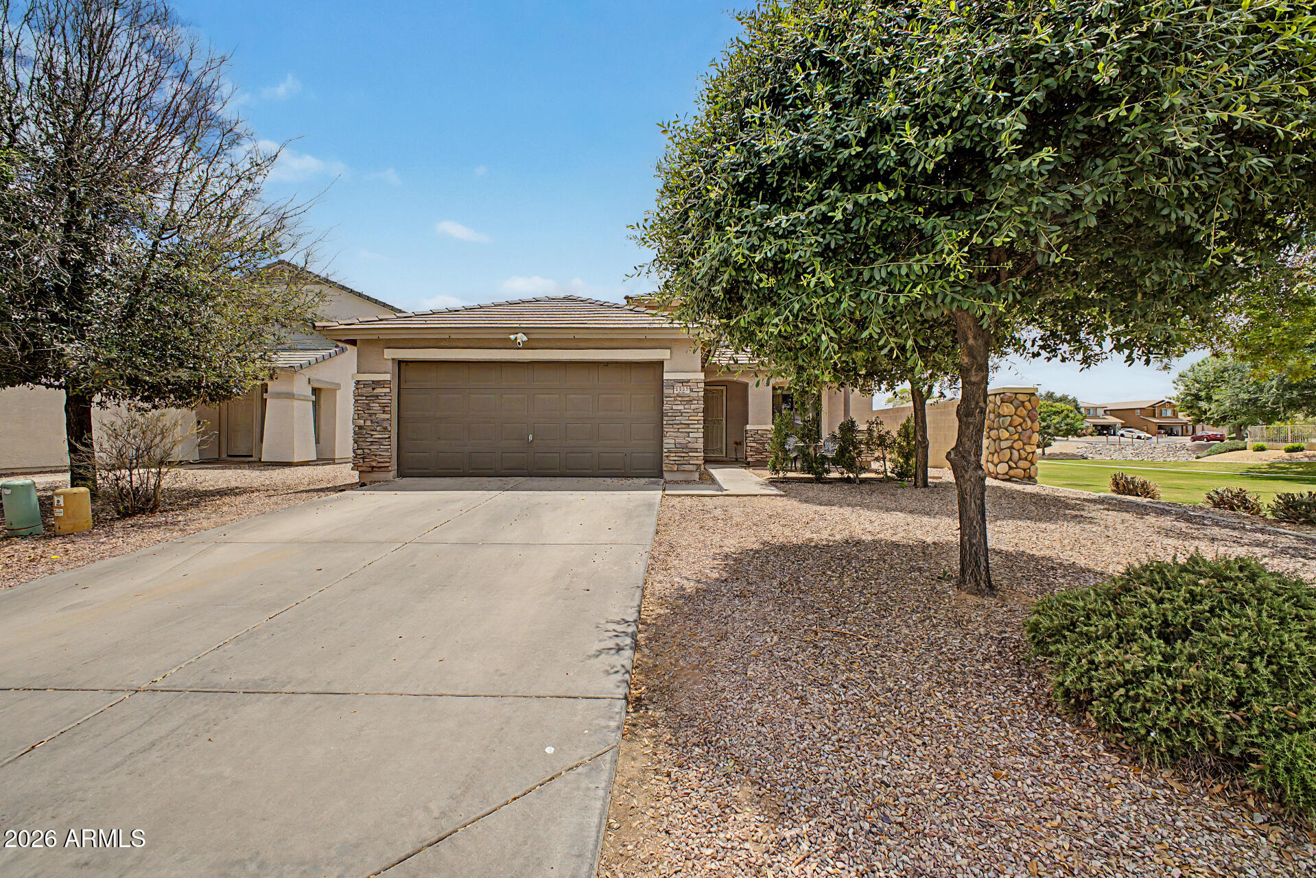 Become a proud owner of this beautiful 3 bed 2 bath home in the gorgeous subdivision of Morning Sun Farms! This stone front accent home is so inviting from the time you drive up & see the lush park next door w/1 neighbor for privacy! Inside home is spacious/very open w/vaulted ceilings in living area/newer ceiling fans/& recessed lighting! Fabulous kitchen w/white cabinets & NEWER stainless steel appliances. HOME HAS NEWER AC UNIT- $15,000 THAT IS VERY ENERGY EFF.  & READY FOR AZ. SUMMER MO. Going out back you'll see the inviting yard where you will enjoy the above the ground pool, trampoline, garden & Trees! Garage has lots of storage space w/ pull down attic, work bench & lots of shelving! & DON'T FORGET ITS JUST ''A WALK IN THE PARK'' AWAY-+ owner W/GIVE CARPET ALLOWANCE/ YOU'LL LUV IT!