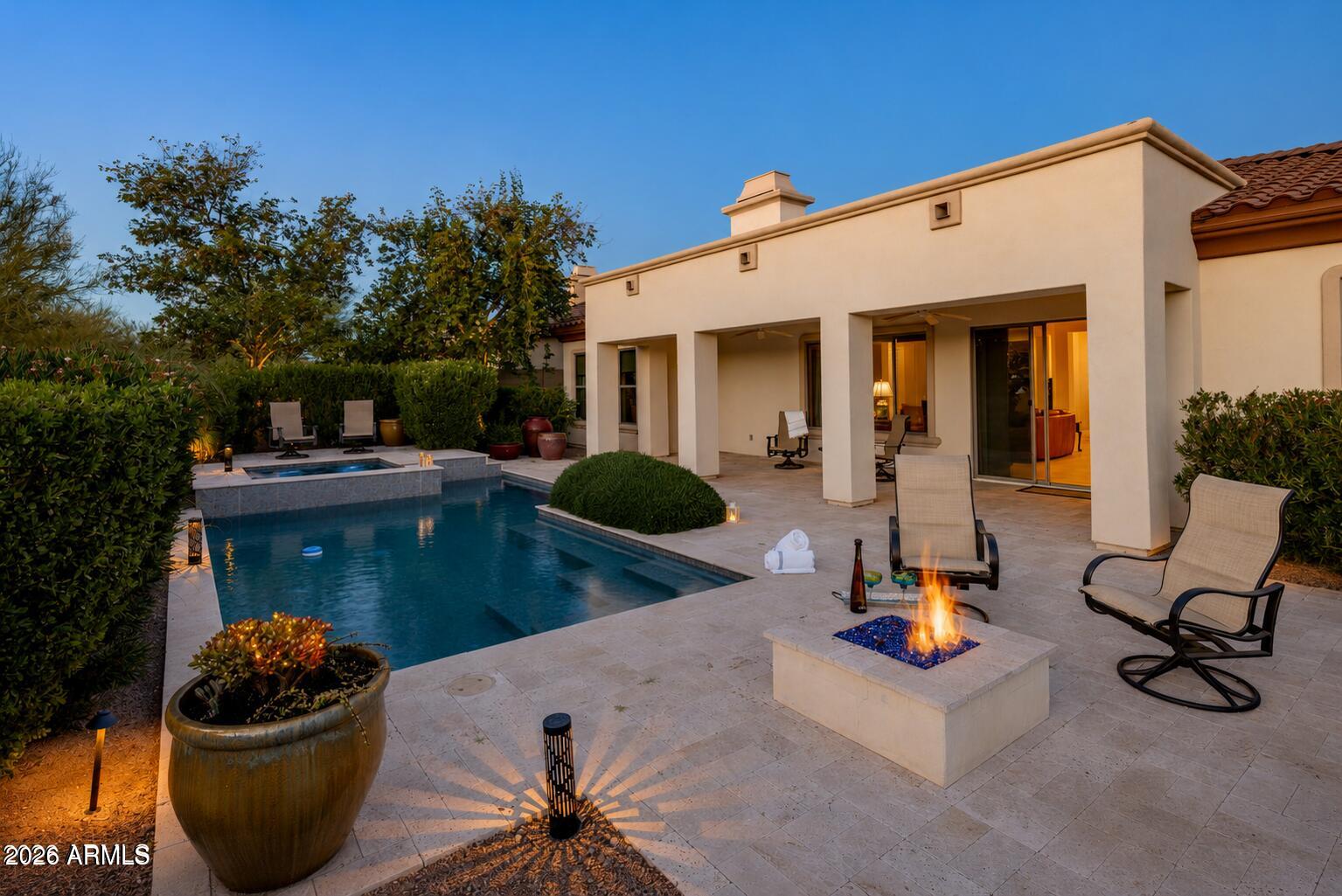 Behind the gates of Montevista, luxury slows down.  This floor plan delivers refined desert living with room to breathe creating ultimate living and entertaining space.
A private courtyard with fireplace sets the tone. Inside, the split floor plan flows easily, designed for both gathering and retreat. The kitchen anchors the home and opens to a great room with fireplace, generous, welcoming, and built for real life. A large flexible bonus room adapts as your days do.
The oversized glass slider dissolves the line between indoors and out, opening to a quiet backyard retreat, backing to a natural wash. Here, a heated pool, spa, built in grill and open desert skies redefine everyday living. Miles of paths, lush greenery, and neighborhood parks surround you.  Close to everything, yet comfortably removed