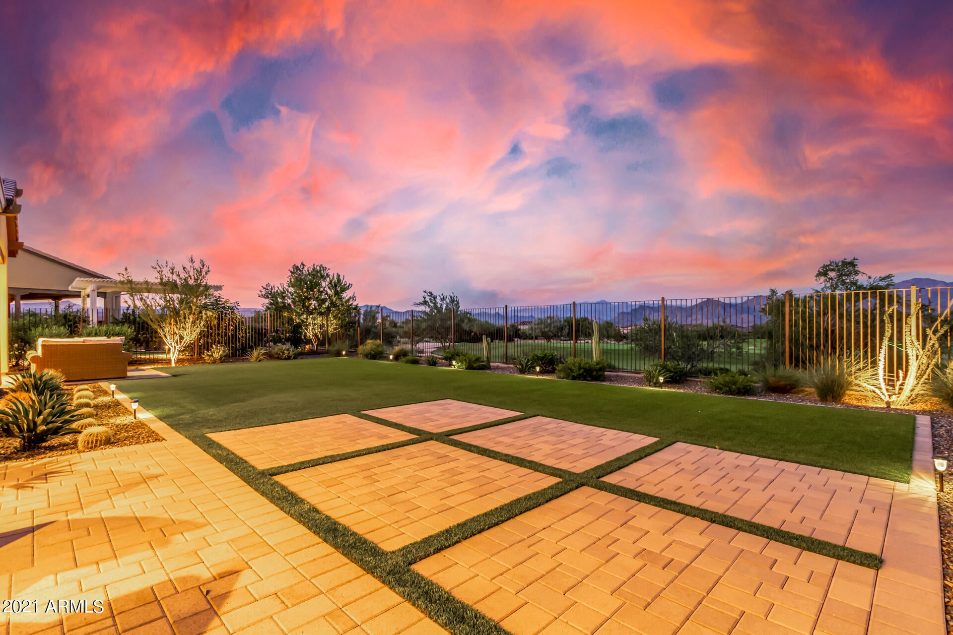 Breathtaking Mountain views on this elevated lot on the coveted 16th Green in the beautiful community of  Trilogy at Verde River! AND, walking distance to Community Amenities!  Paver courtyard entry w/an inviting fireplace. Tall ceilings, engineered wood floors,  upgraded lighting/ceiling fans,  bountiful natural light, & a warm neutral palette that can go Tan or Grey . The gourmet kitchen features staggered white cabinets w/crown molding, tile backsplash, granite counters,  high-end SS appliances, recessed lighting, and an island with breakfast bar. Formal dining area w/patio access & retractable doors. Den w/built-in bookcases. All bedrooms include a private upscale bathroom, plantation shutters, & ceiling fans.  The main retreat boasts backyard access, spa-like en suite w/dual sinks, and walk-in closet.  Large laundry room w/a built-in desk & storage cabinets. Sensational backyard setting w/a paver covered patio, built-in BBQ, artificial turf w/a paver patio, & nestled on a Golf Course view lot. Magnificent Mountain views & sunsets! 

Trilogy at Verde River is a Resort Style community featuring something for everyone! Golf, tennis, pickle ball, bocce ball, heated lap pool and swimming pool, hot tub, fitness center, demonstration kitchen and a 7.5 acre dog park. The community center has casual and fine dining, luxury spa and events center. Trilogy at Verde River is adjacent to the Tonto National Forest and is situated in the middle of miles and miles of hiking and biking trails. Live like you're on vacation!