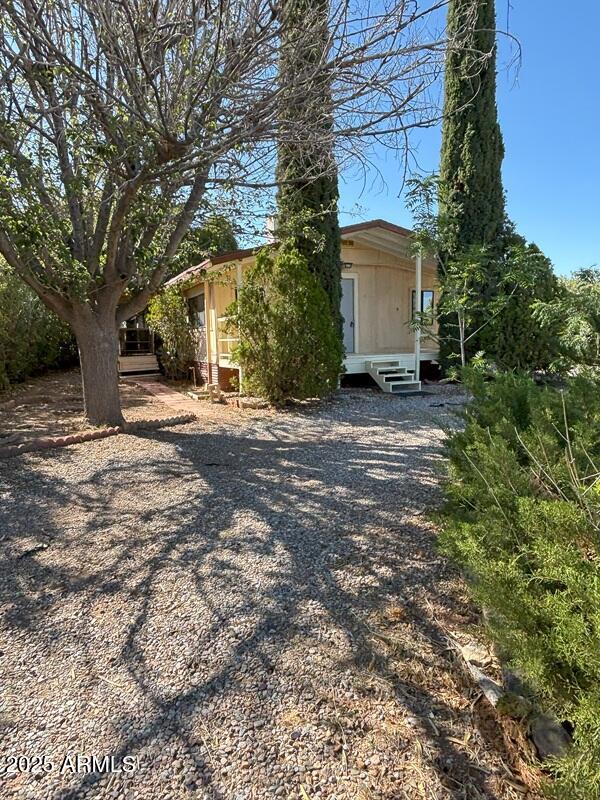 3 Bedroom 2 Bath double wide trailer in Golden Acres trailer park.  Has a U shaped driveway in front of the home for easy in / out, plus a gated car port. Tool shed, new windows, carport, ceiling fans, evaporative cooler. Golden Acres park does not have a land lease.  The HOA provides garbage service.