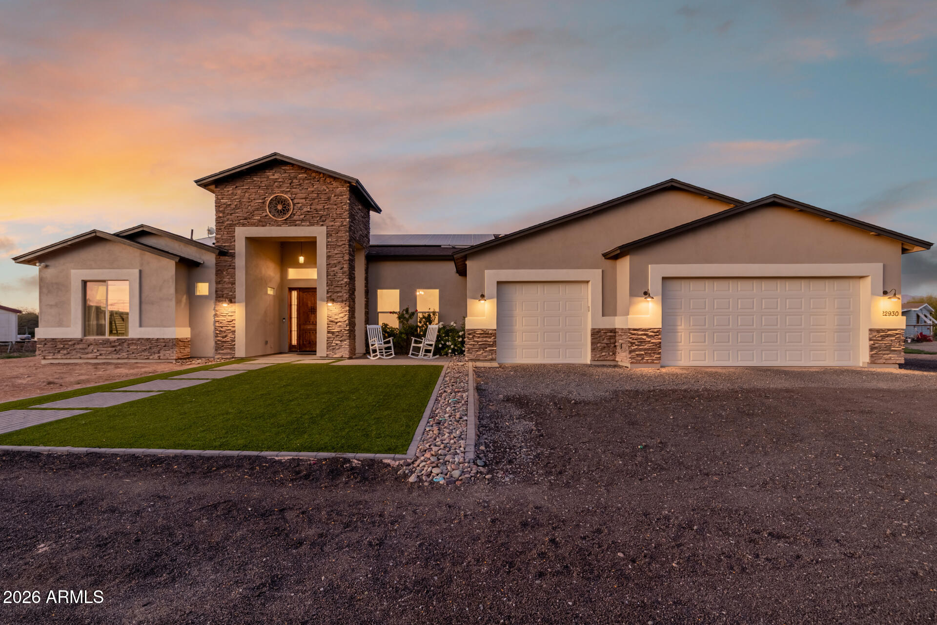 Stunning single-story home on a generous lot of a private cul-de-sac on a county island with NO HOA! You'll love the OWNED solar panels for energy efficiency! Exceptional curb appeal welcomes you with new paint inside and out, stone accents, paver seating areas, synthetic grass, & 3-car garage. A desirable split floor plan showcases tile floors, elegant light fixtures,  & thoughtfully designed living spaces throughout. Entertain with ease in the formal dining room or relax in the expansive great room featuring vaulted ceilings, fireplace, recessed lighting, pre-wired surround sound, & a dramatic 4-panel sliding pocket door. A carpeted den with French glass doors offers the perfect flex space for a media room! Open-concept kitchen has a two-tier island breakfast bar, wood cabinets with crown moulding, SS appliances, pot filler, stylish backsplash, granite counters, walk-in pantry, & a butler's service area. The romantic main bedroom enjoys private backyard access, walk-in closet, & spa-like bath complete with dual sinks, modern tub, rain shower, & direct access to the laundry room. Each secondary bedroom features its own private bathroom! Oversized backyard comprises green grass, playground, covered patio, fenced pool with slide, waterfall, & trampoline, a rooftop with mountain views, & a wide-open space for animals to roam, entertaining, or creating whatever outdoor lifestyle you envision. This home truly has it all!