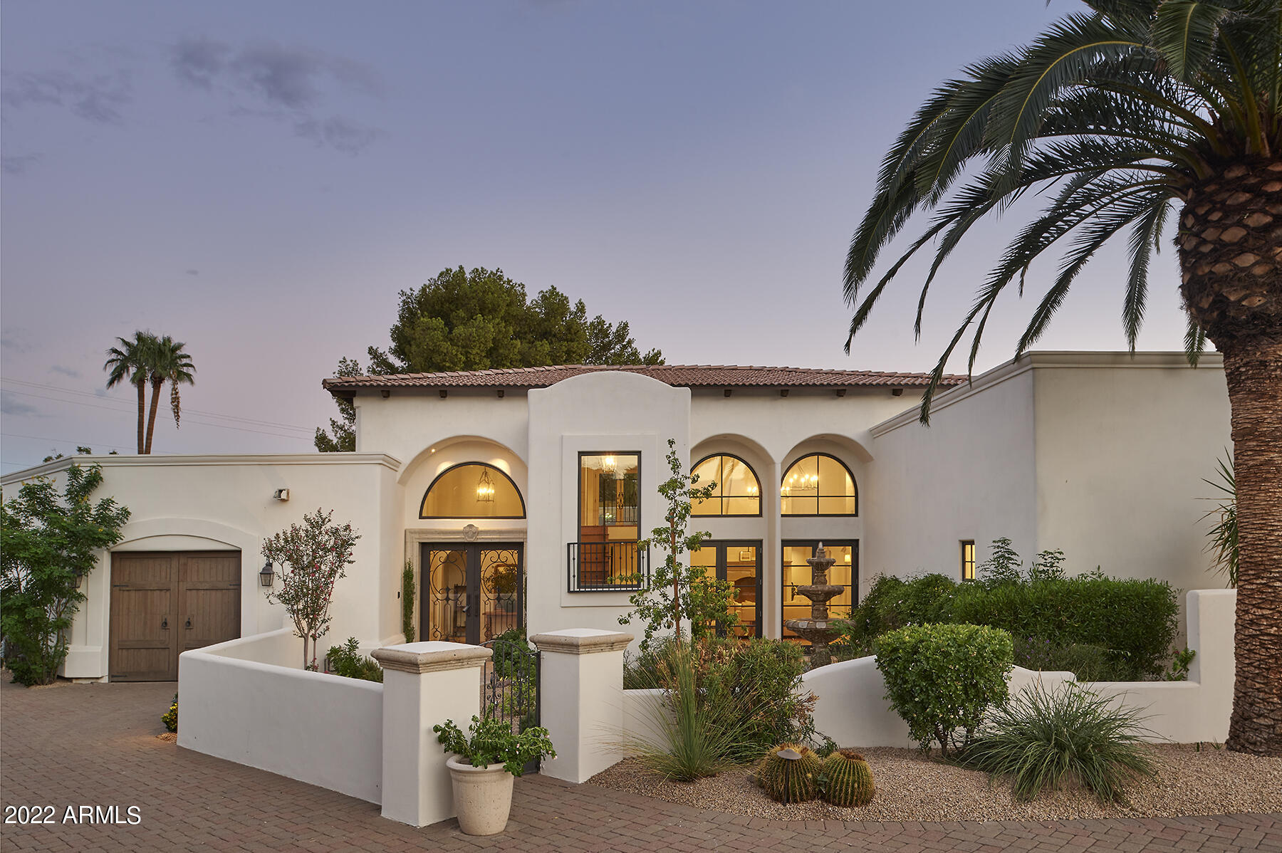Amazing Santa Barbara inspired resort feel single family home located in the coveted Casa Blanca Estates community. The home has been totally renovated inside and out and is nestled on .75 of an acre with low maintenance lock and go landscaping, amazing entertaining spaces and a fully renovated heated resort style pool and spa that can be controlled from your smartphone.
Features include 5 bedrooms, 5 and half baths, private compound feel with faux grass area, 24x7 gated community, low maintenance landscaping, game room, high ceilings, lots of light, split floor plan, and 3 car garage. This property is incredible.