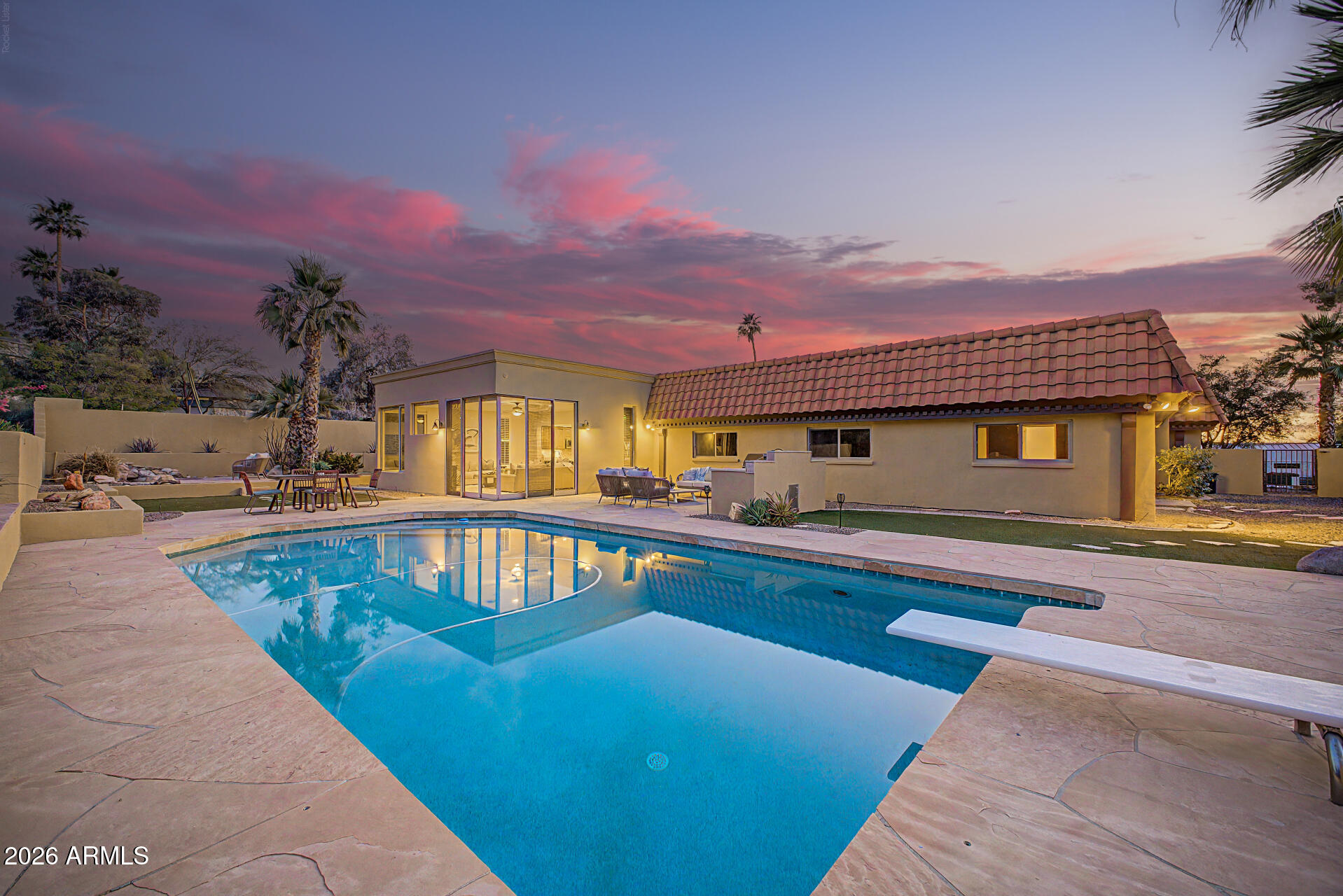 Nestled in the heart of Camelback Canyon Estates, this immaculate home showcases incredibly stunning views & privacy. Entry leads to a large family/entertainment room & dining area.  Relax by the fireplace while enjoying gatherings in large Gourmet Kitchen with a Large Island, Stainless Steel appliances, Dual Oven, 4-Door Refrigerator, 5-Burner Gas Cooktop, Extensive Cabinet Space, & Office Space with a walk-in Pantry. Family Room has large windows & large sliding doors providing the most amazing views of Camelback Mountain & Praying Monk. Main bedroom includes a den, fireplace, reading area a main closet fit for royalty. Additional 3 bedrooms provide mountain views as well. Resort style backyard with swimming pool is ready for entertaining. Walking distance to Echo Canyon, Restaurants, Camelback Mountain, The Global Ambassador, Steak 44, The Henry, Buck & Rider, & many more of the local fine dining restaurants. You will enjoy some of the most memorable trails in the valley. This home is a true local treasure.