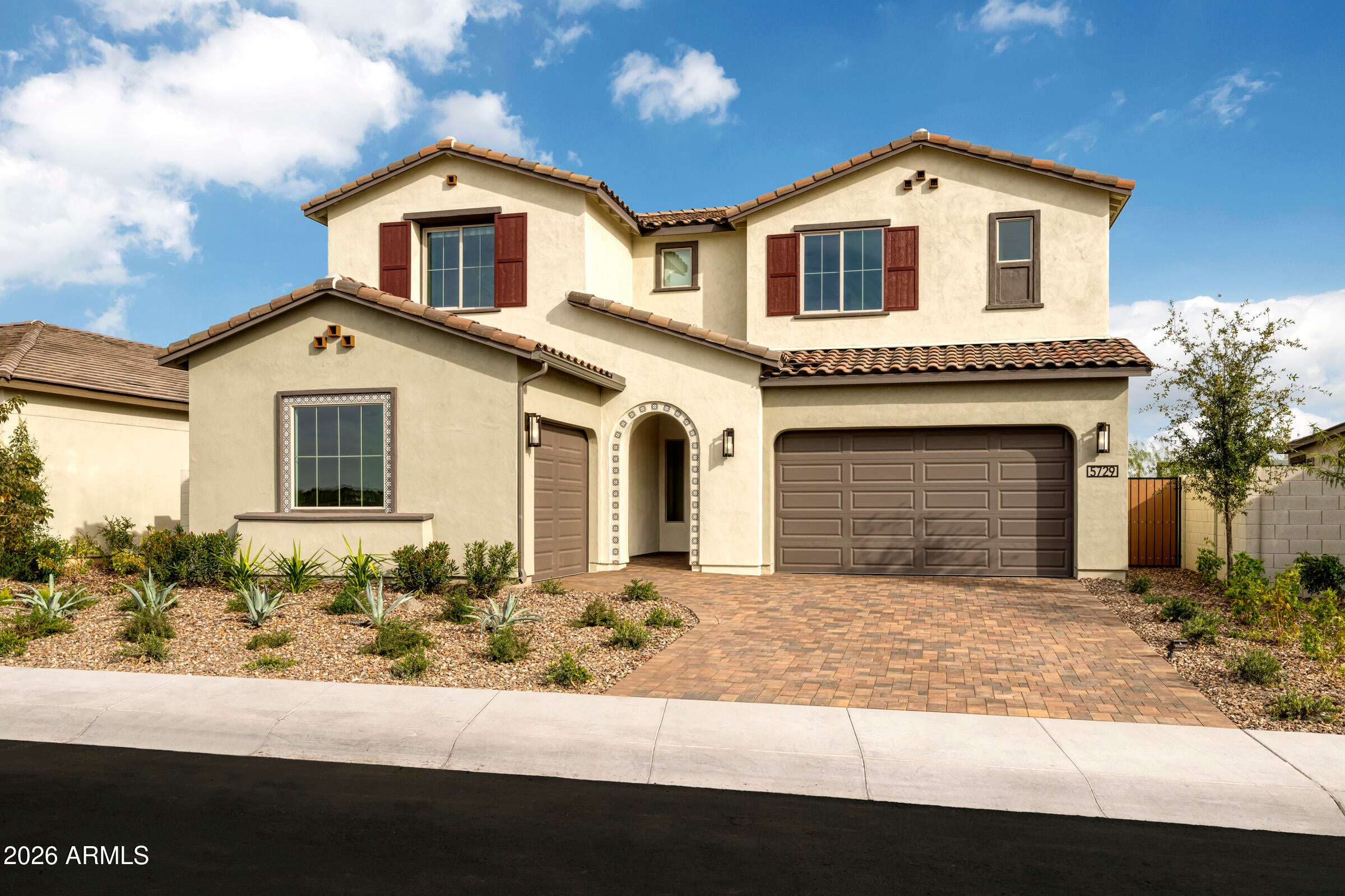 Own a professionally designed Tri Pointe Homes MODEL HOME offering 3,973 sq ft, 5 Bedrooms, 4.5 Baths--complete with furniture, artwork and designer finishes included. Showcasing exceptional upgrades throughout, this home features a stunning Kitchen with stainless executive gas appliance package, double ovens, Diamond Stately cabinetry, waterfall quartz island, counter-depth refrigerator and wine center. The Dining Room is enhanced by a 16' multi-slider and additional base cabinetry. Enjoy seamless indoor-outdoor living with an extended covered patio and professionally landscaped front and back yards. Custom paint, décor and a garage service door complete this one-of-a-kind opportunity.