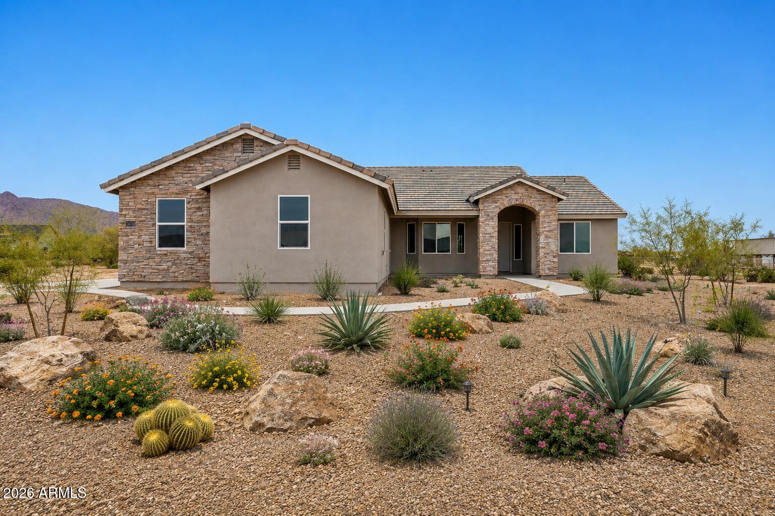 TO BE BUILT stunning new construction on a MASSIVE 2.5 acre lot. This incredible property is elevated with incredible Mountain & Desert views, no HOA, and direct access to trails throughout the County land to the south. Discover the 2331 plan which includes a gourmet kitchen impresses with upgraded cabinetry, quartz countertops, a massive center island, and a walk-in pantry complete with cabinetry and counter space. The spacious great room showcases a dramatic sliding glass wall that opens to the outdoors and a beautiful stone fireplace centerpiece. Luxury continues throughout the home with custom tile showers, wide-plank wood like tile flooring, a freestanding soaking tub in the owner's suite, and so much more! Home is to be built upon an executed purchase contract. Contact LA for info.