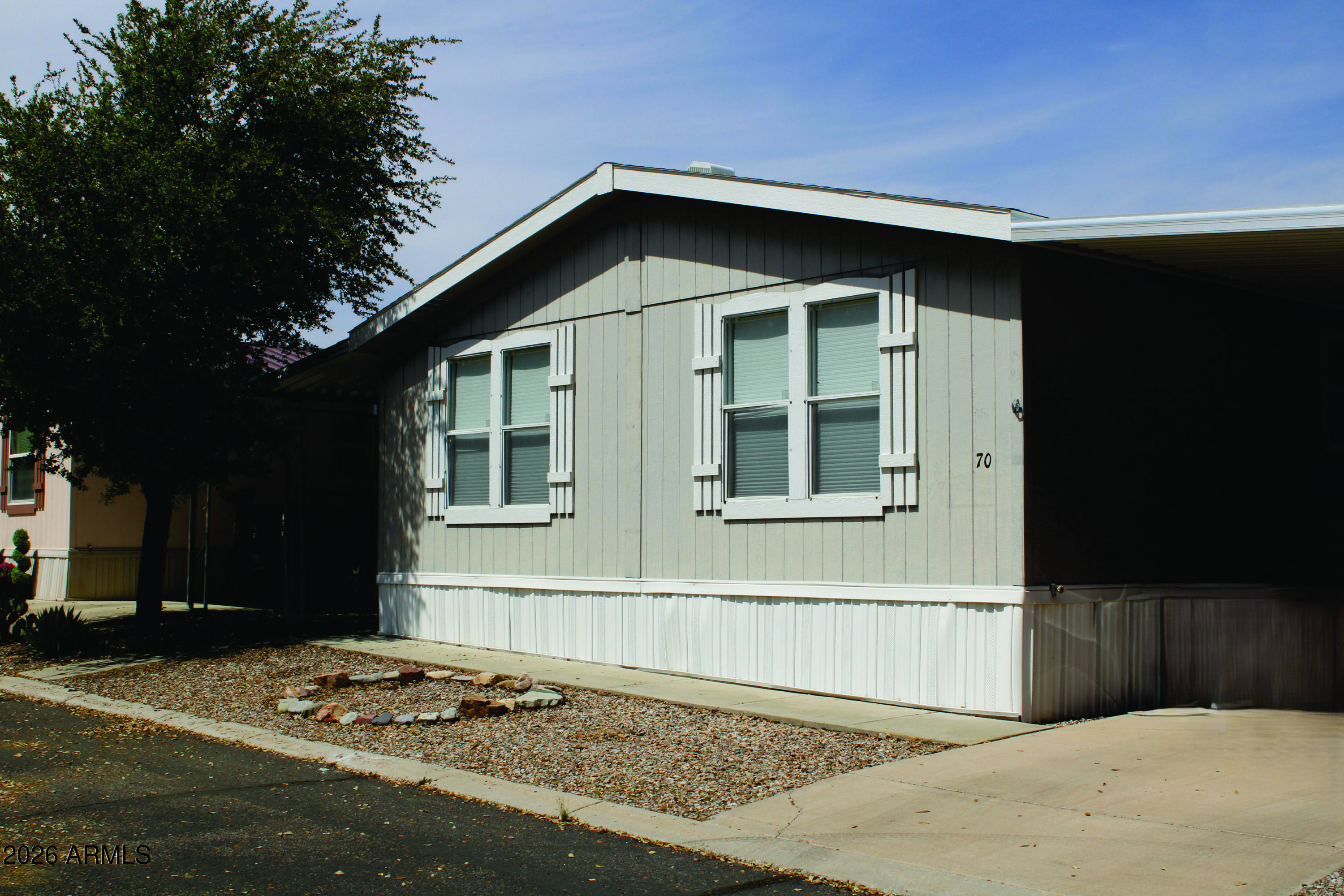 This well maintained 3 bedroom 2 bathroom manufactured home is waiting for its next homeowner. Decks on both sides as well as covered carport and storage shed. Laundry room and open living room. Sale is for home only. Home sits on leased lot in the 55+ community of San Pedro Resort. Park amenities included community pool, laundry facilities and activity center. Buyer will need to apply and be accepted by the park also.
