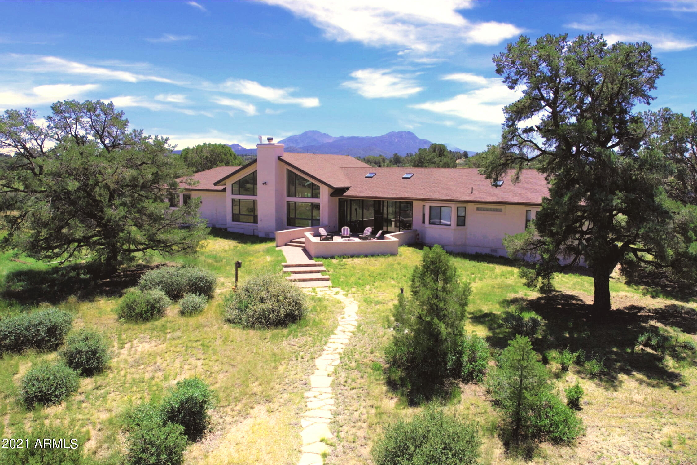 Welcome to Burnt Water Ranch situated in the high desert of Northern Arizona, just outside of Prescott. Come partake in the spectacular surroundings of this distinguished equestrian property set on 145 acres with Granite Mountain as the backdrop. The ranch is tranquil and stunningly beautiful with acres of flowing grass, majestic trees and wholistic grazing pastures. If you are looking for a fabulous horse property, this Ranch probably has it. Complete with perimeter and cross fencing, this estate encompasses the 3484 sf single level home, 1034 sf guest/ranch hand house, 8 stall horse barn, 40X80 equipment barn and a hay barn. Horse facilities include arena with viewing deck, horse washing area, anti-freeze watering stations, 6 major pastures and 5 small paddocks with shelters. See Docs.